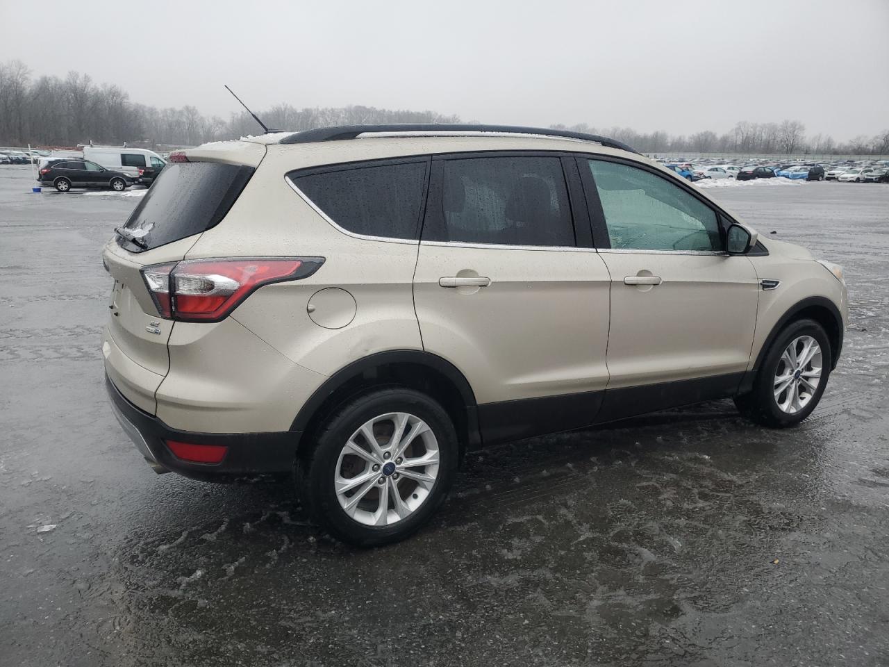 2017 Ford Escape VIN 1FMCU9GD8HUA07552 Copart auction photo, side / minor dent/scratches damage thumbnail 3