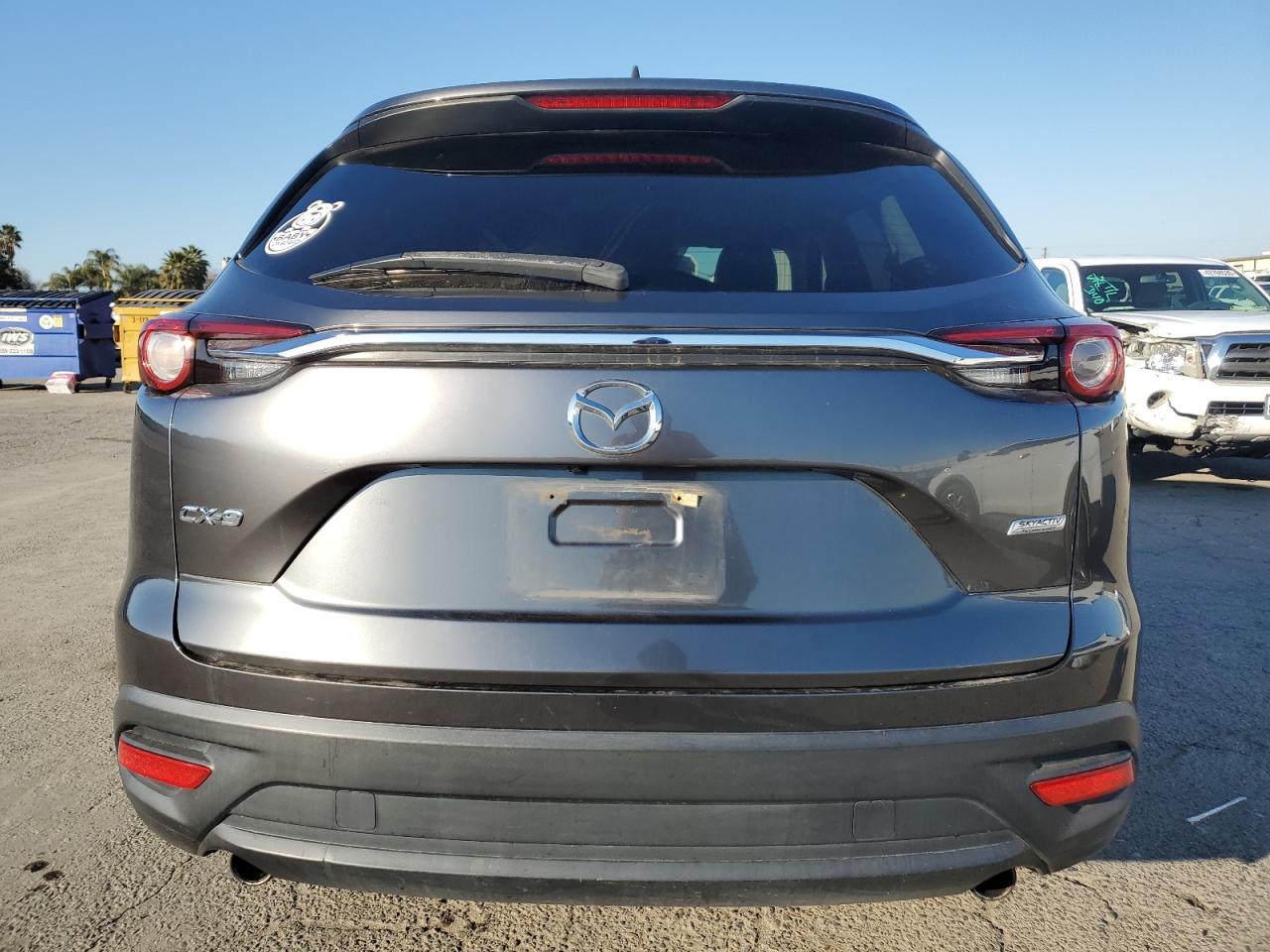 2019 Mazda CX-9 VIN JM3TCACY1K0306940 Copart auction photo, front end / side damage thumbnail 6