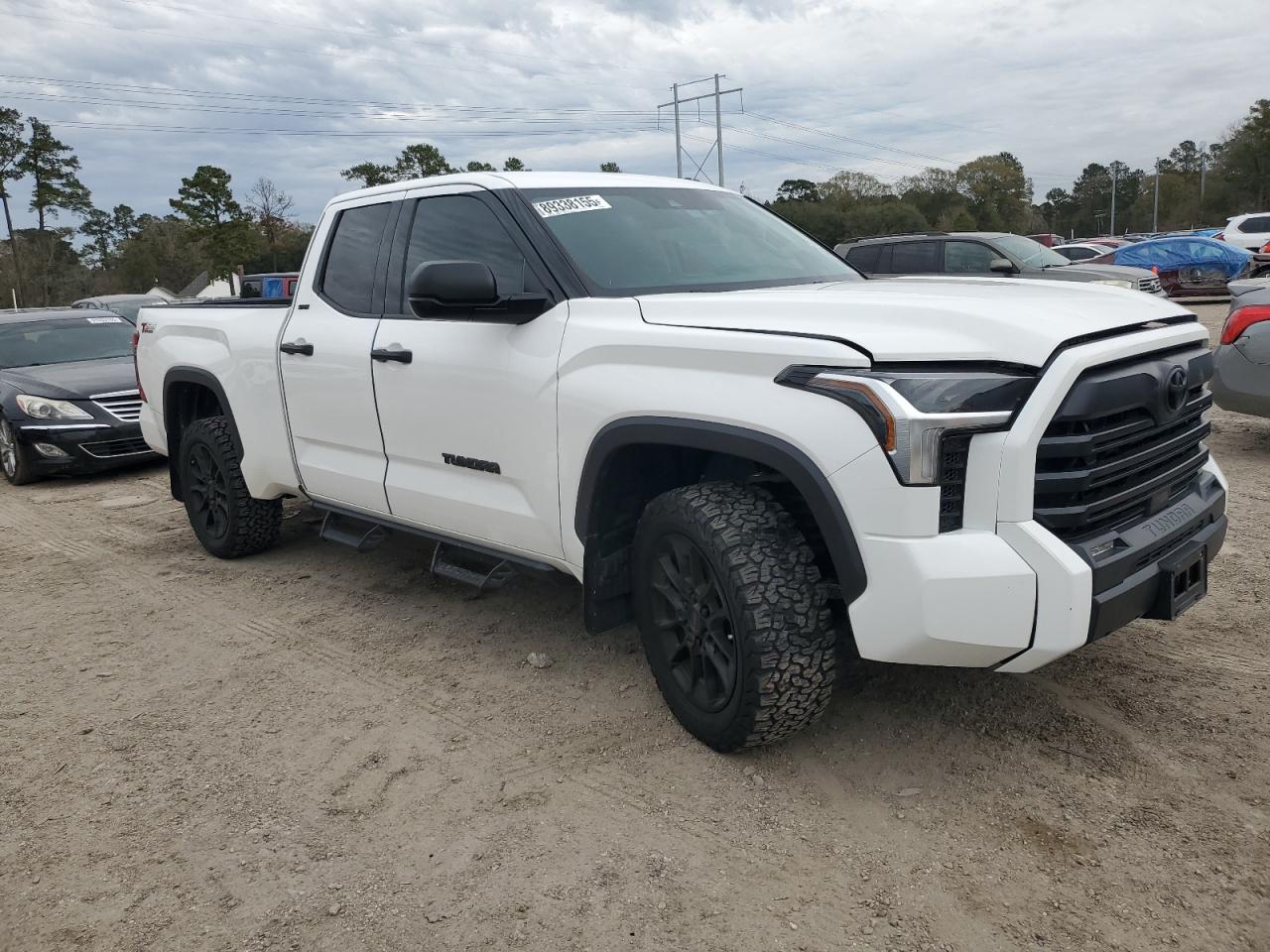 2023 Toyota Tundra VIN 5TFLA5DA3PX092040 Copart auction photo, side / front end damage thumbnail 4