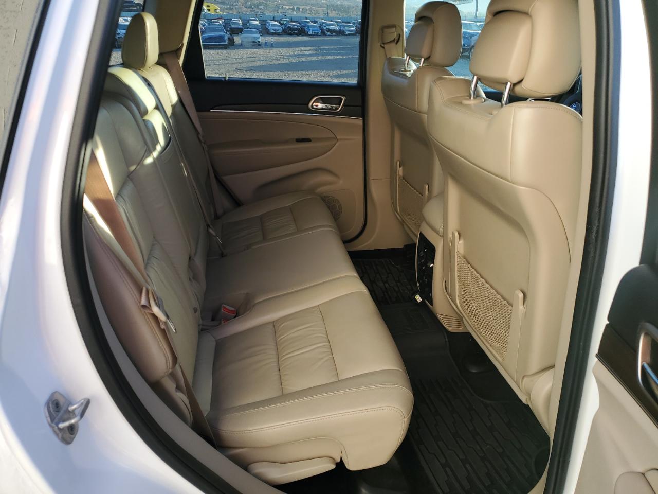 2014 Jeep Grand Cherokee VIN 1C4RJFBG3EC290029 Copart auction photo, side / undercarriage damage thumbnail 11