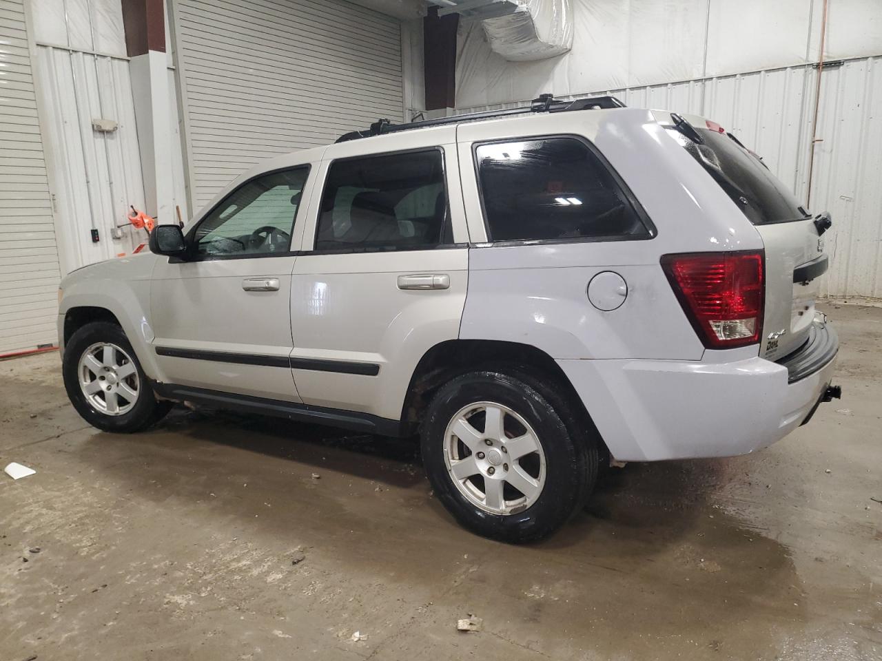 2009 Jeep Grand Cherokee VIN 1J8GR48K09C534704 Copart auction photo, side / front end damage thumbnail 2