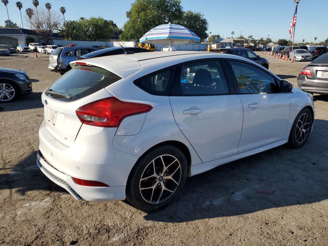 2015 Ford Focus VIN 1FADP3K29FL334599 Copart auction photo, rear end damage thumbnail 3