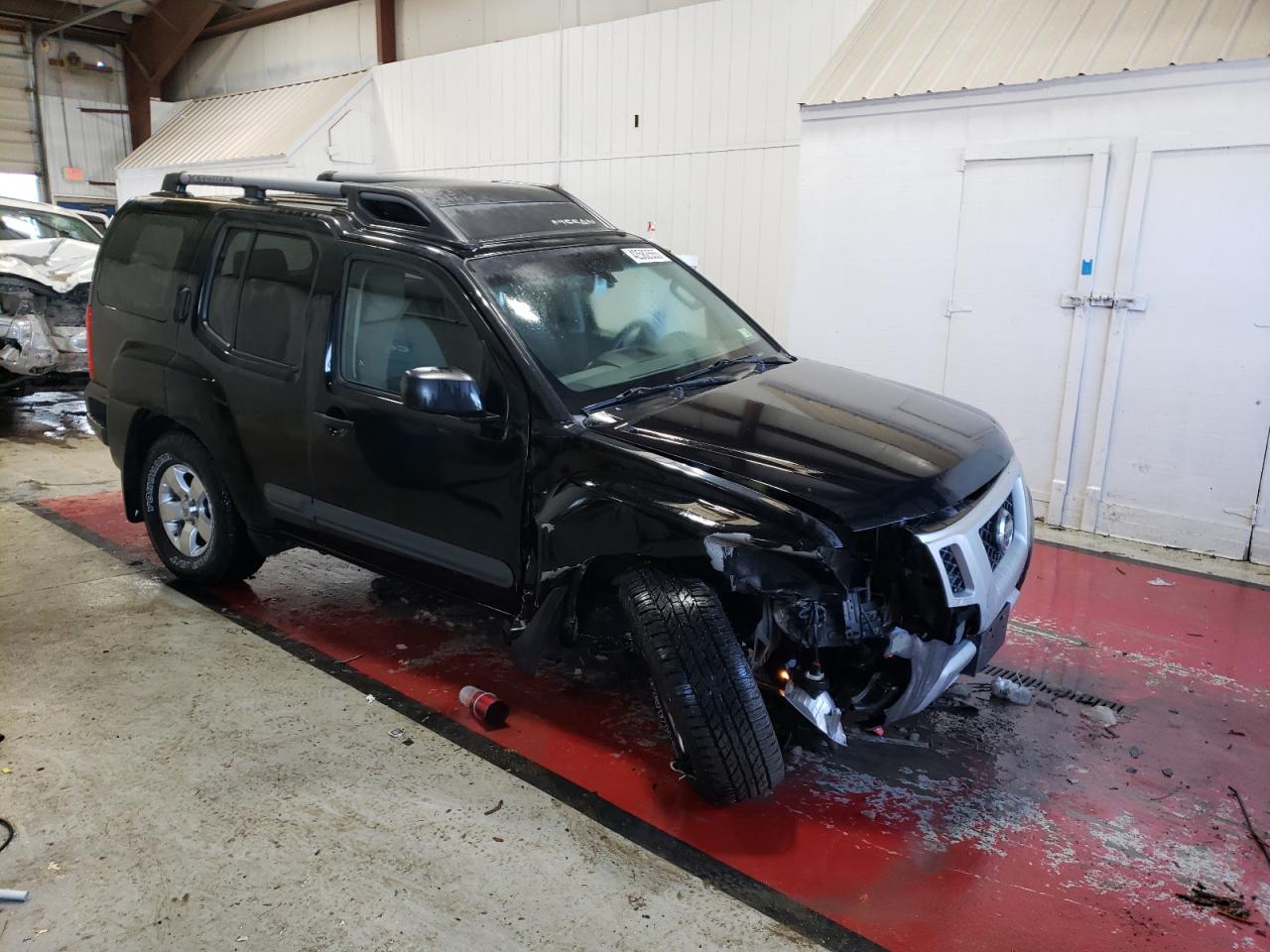 2013 Nissan XTerra VIN 5N1AN0NW2DN811807 Copart auction photo, front end damage thumbnail 4