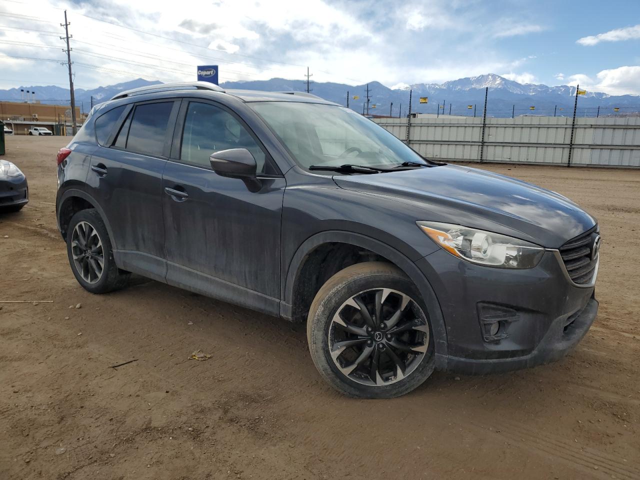 2016 Mazda CX-5 VIN JM3KE4DY0G0633861 Copart auction photo, front end / undercarriage damage thumbnail 4