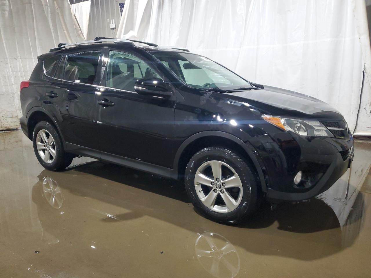 2015 Toyota RAV 4 VIN 2T3RFREV2FW317958 Copart auction photo, front end damage thumbnail 4