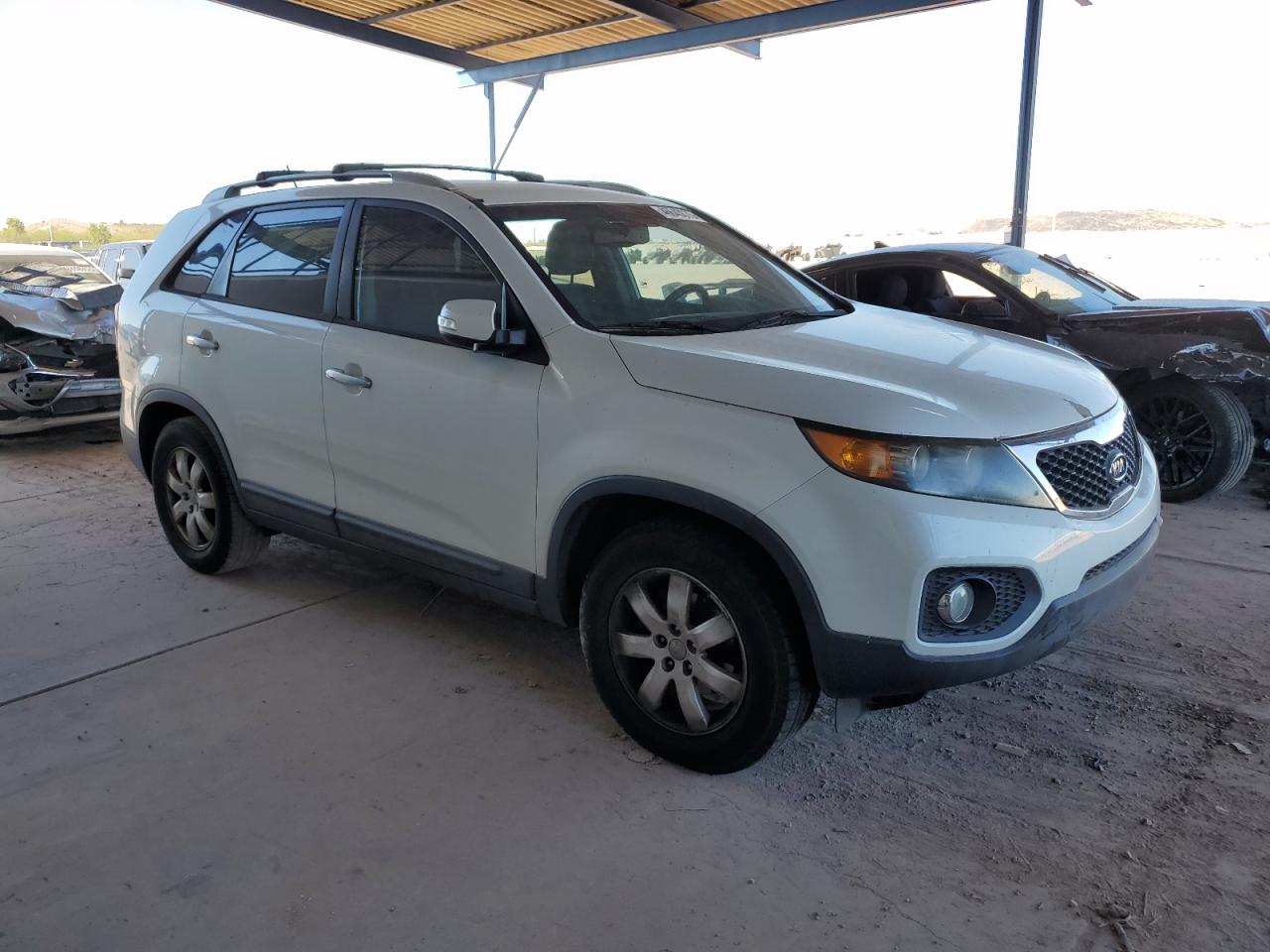 2012 KIA Sorento VIN 5XYKT4A2XCG213060 Copart auction photo, minor dent/scratches damage thumbnail 4