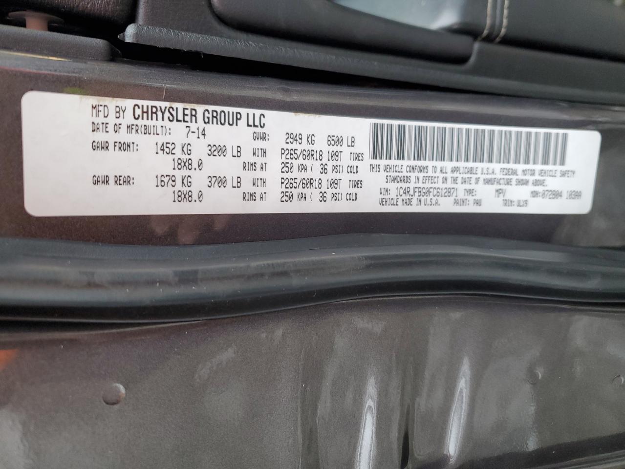 2015 Jeep Grand Cherokee VIN 1C4RJFBG0FC612871 Copart auction photo, vandalism damage thumbnail 13