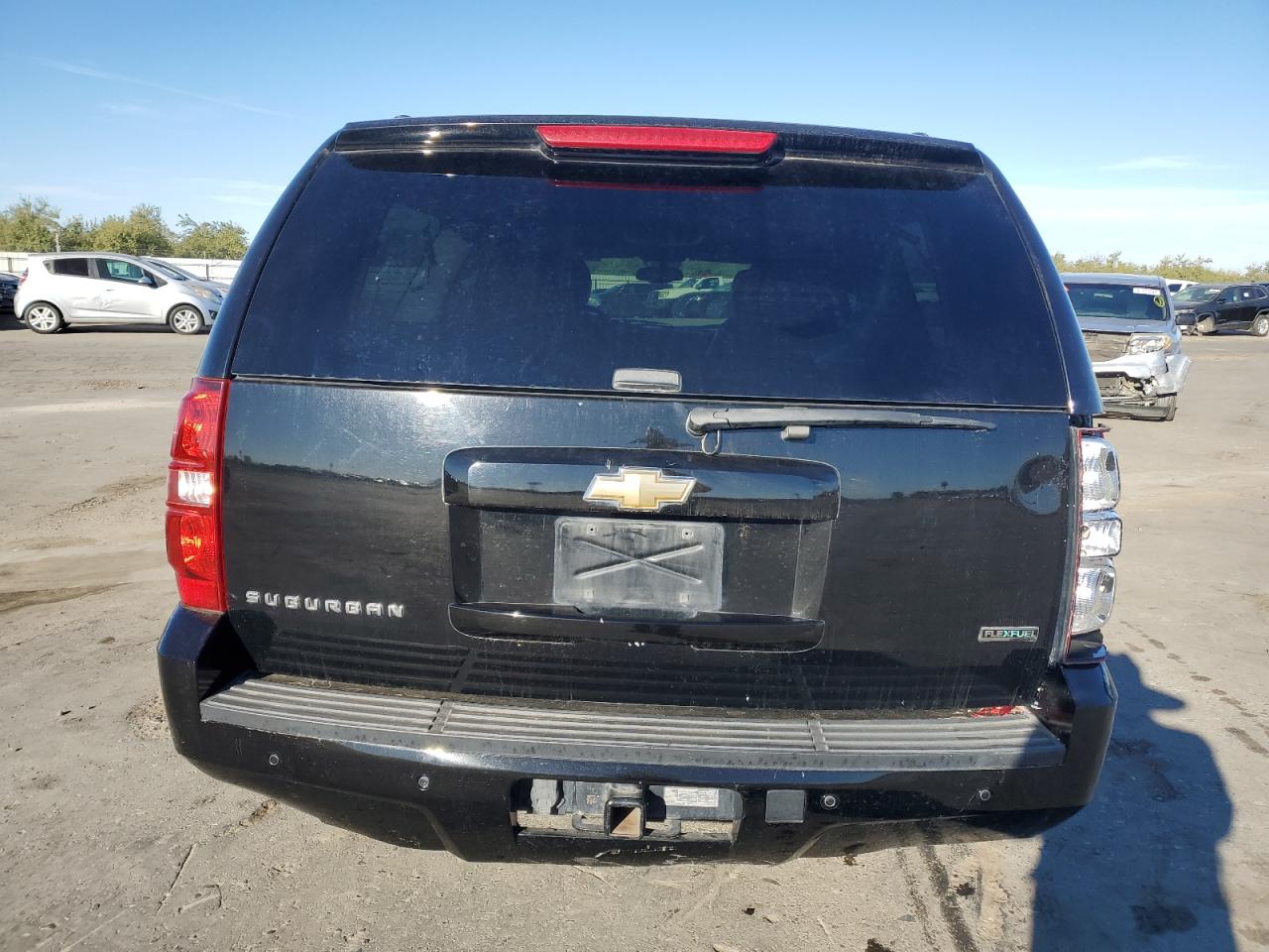 2011 Chevrolet Suburban VIN 1GNSCJE02BR327617 Copart auction photo, rear end / undercarriage damage thumbnail 6