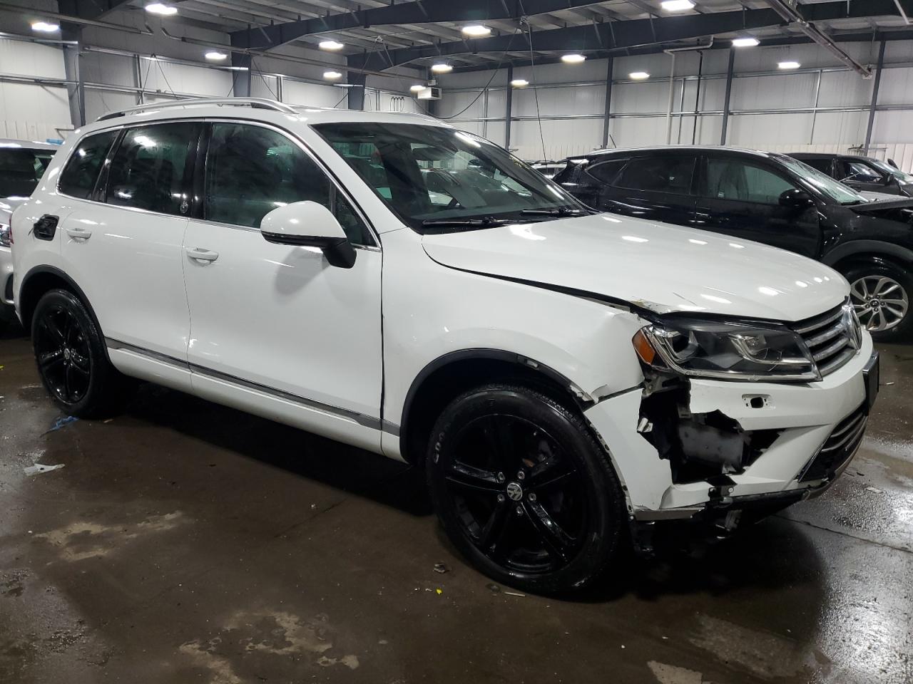 2017 Volkswagen Touareg VIN WVGRF7BP7HD002143 Copart auction photo, front end damage thumbnail 4