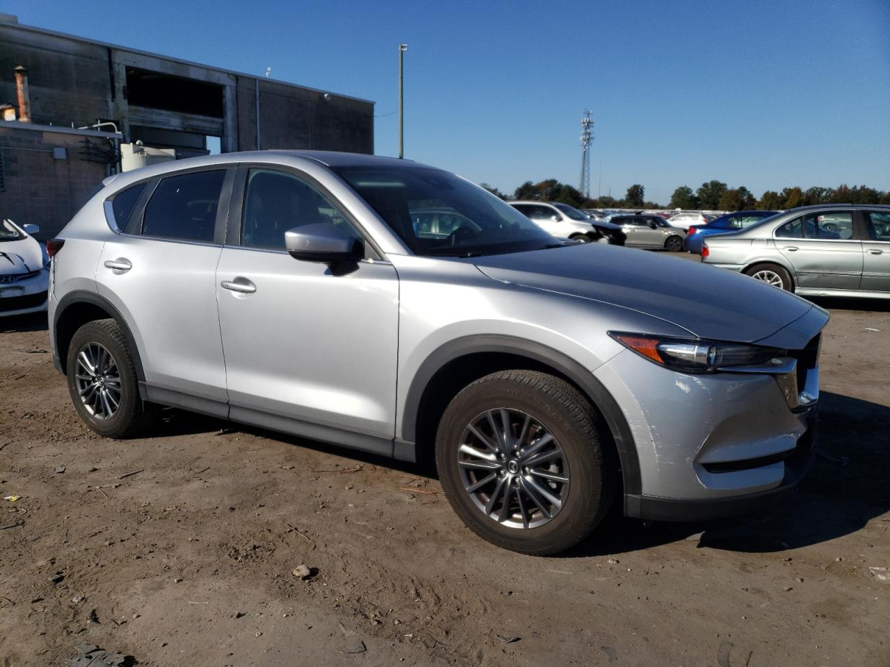 2019 Mazda CX-5 VIN JM3KFBCM5K0667173 Copart auction photo, side / rear end damage thumbnail 4