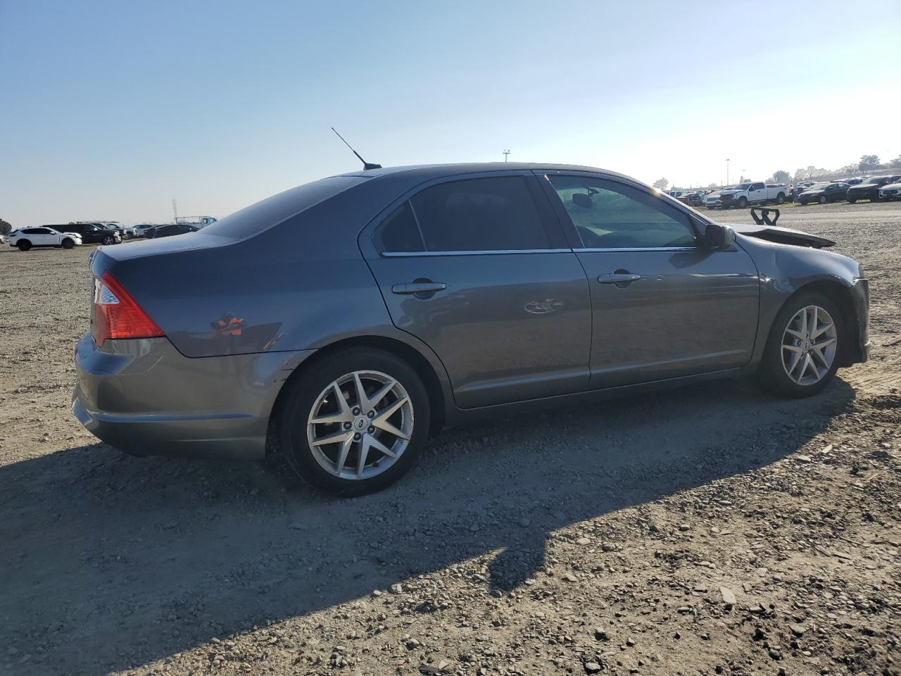 2012 Ford Fusion VIN 3FAHP0CG9CR212641 Copart auction photo, front end / rear end damage thumbnail 3