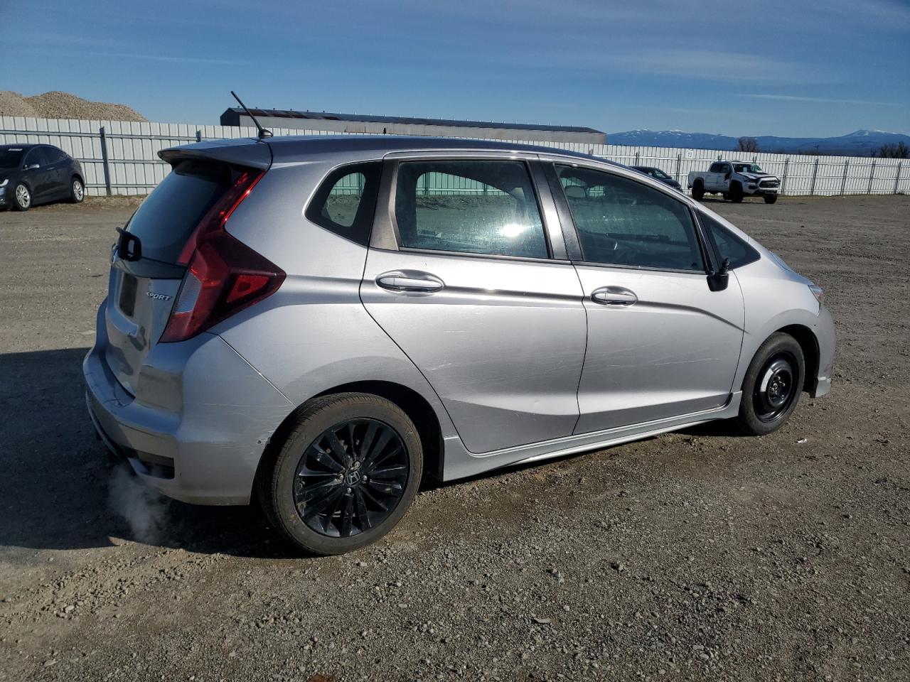 2018 Honda Fit VIN 3HGGK5H64JM732968 Copart auction photo, vandalism damage thumbnail 3