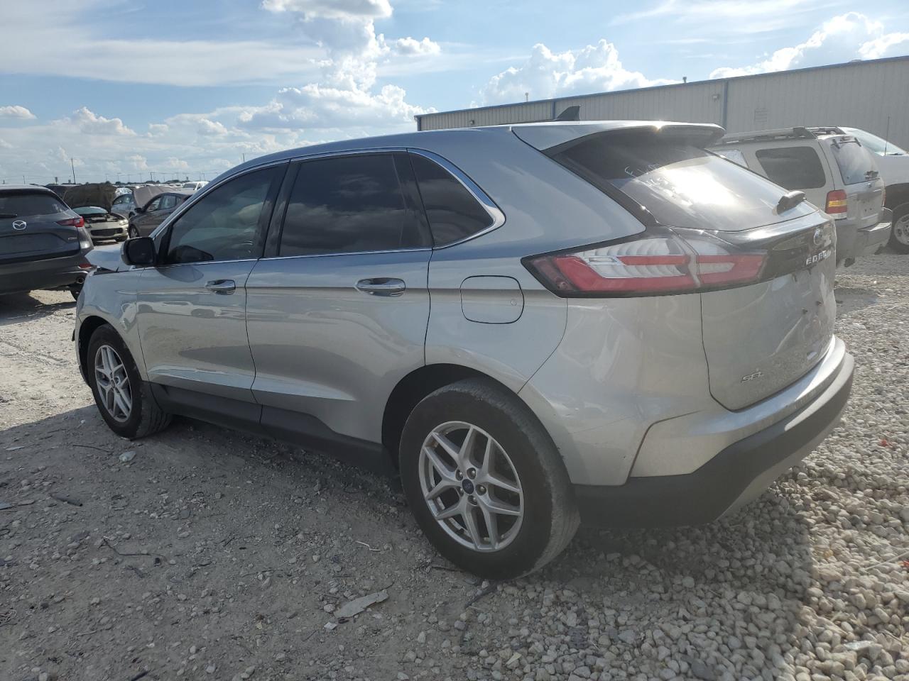 2021 Ford Edge VIN 2FMPK3J99MBA01087 Copart auction photo, front end / minor dent/scratches damage thumbnail 2