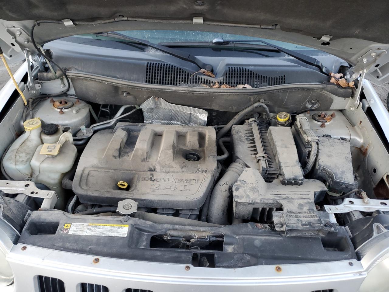 2010 Jeep Compass VIN 1J4NF4FB8AD601410 Copart auction photo, side / front end damage thumbnail 12