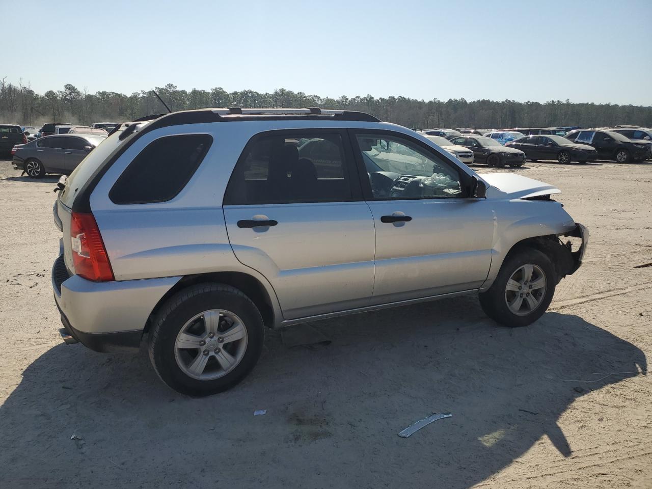 2010 KIA Sportage VIN KNDKG3A40A7700990 Copart auction photo, front end damage thumbnail 3