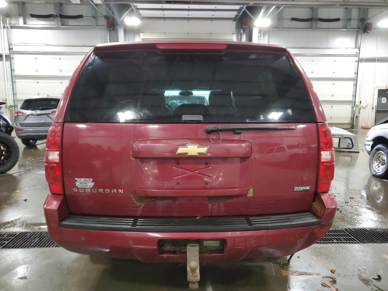 2007 Chevrolet Suburban VIN 1GNFK16327J228878 Copart auction photo, vandalism damage thumbnail 6