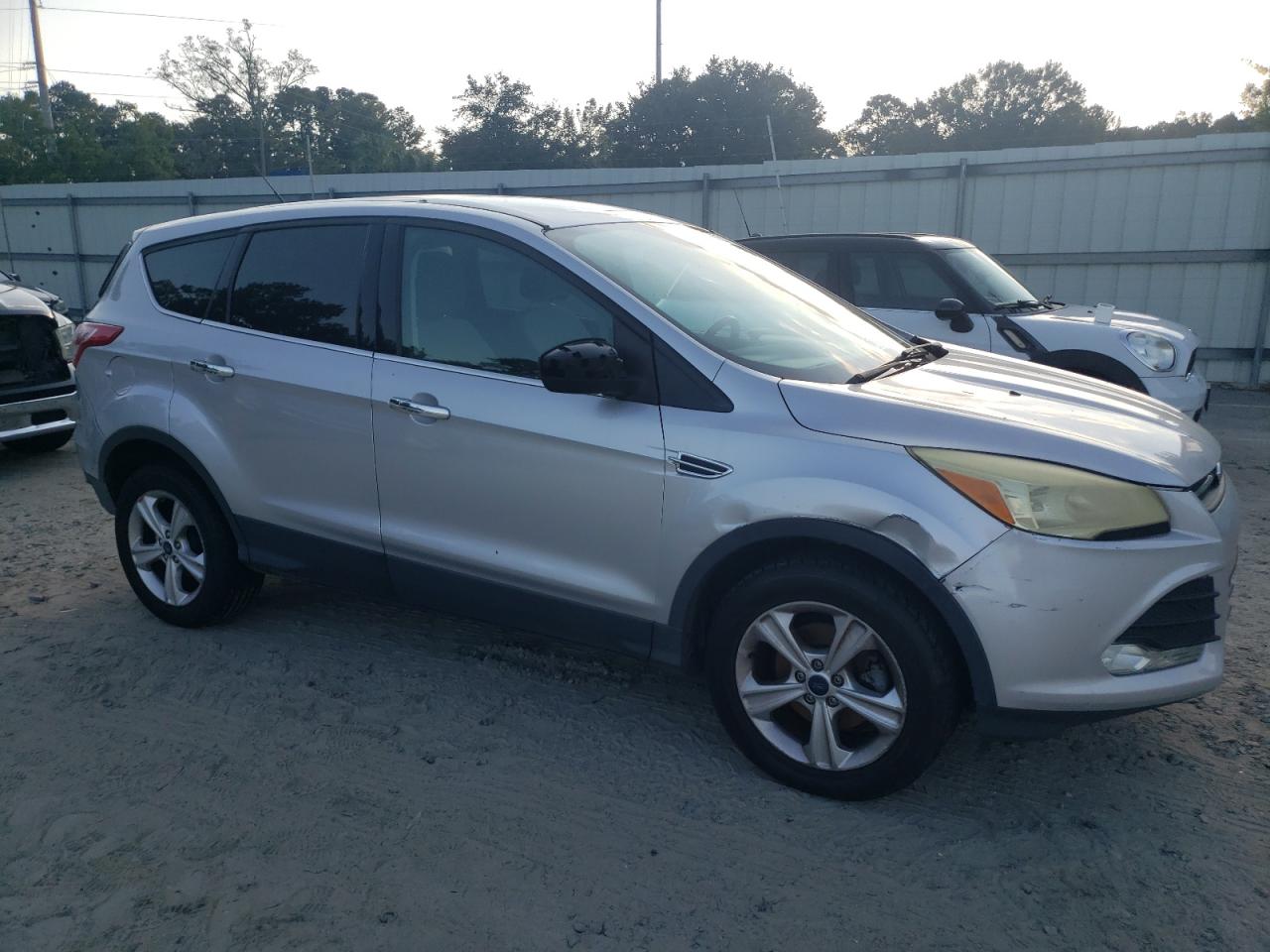 2015 Ford Escape VIN 1FMCU0GX8FUA93657 Copart auction photo, rear end / front end damage thumbnail 4