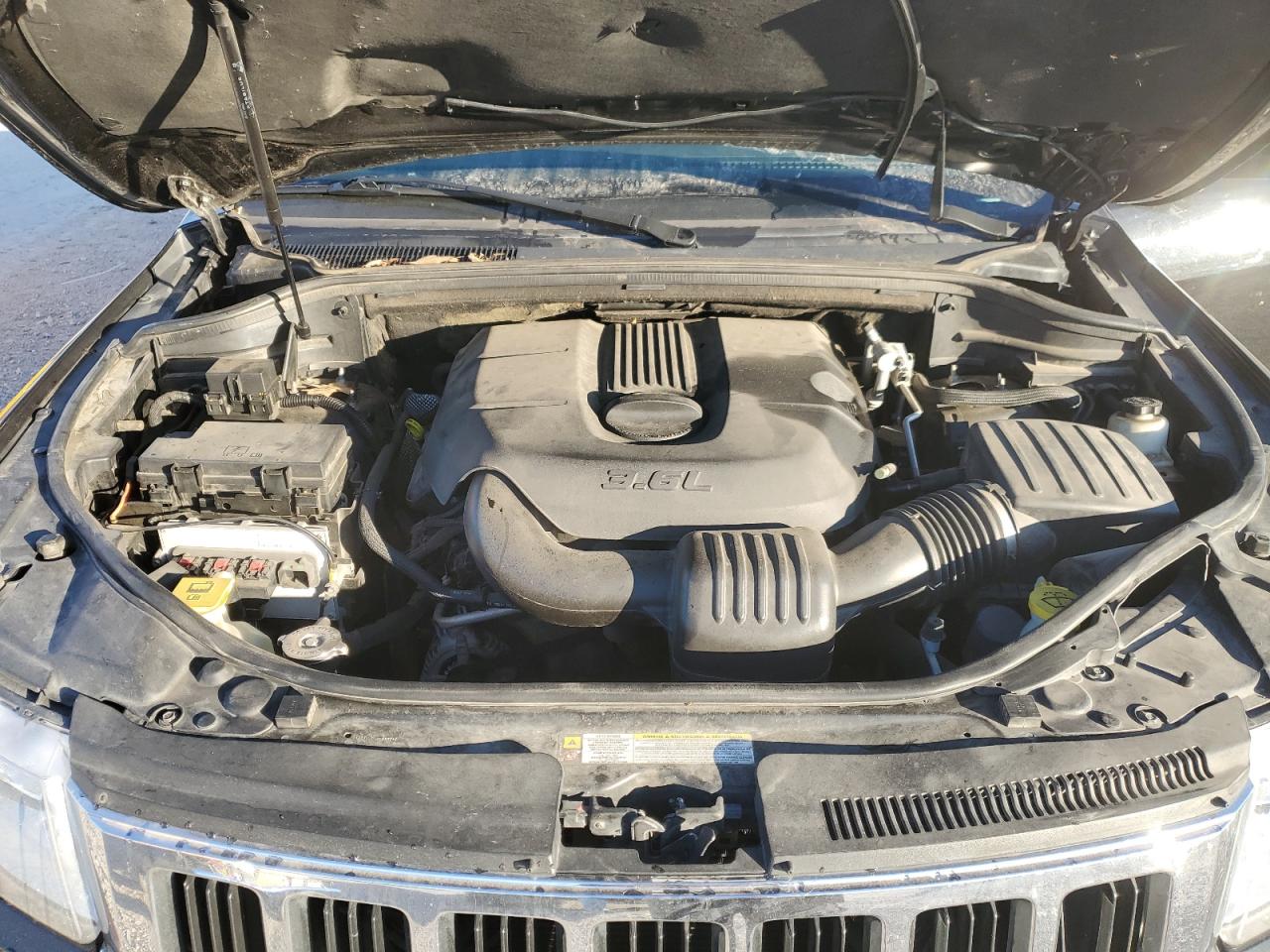 2011 Jeep Grand Cherokee VIN 1J4RR4GG1BC615711 Copart auction photo, side damage thumbnail 12