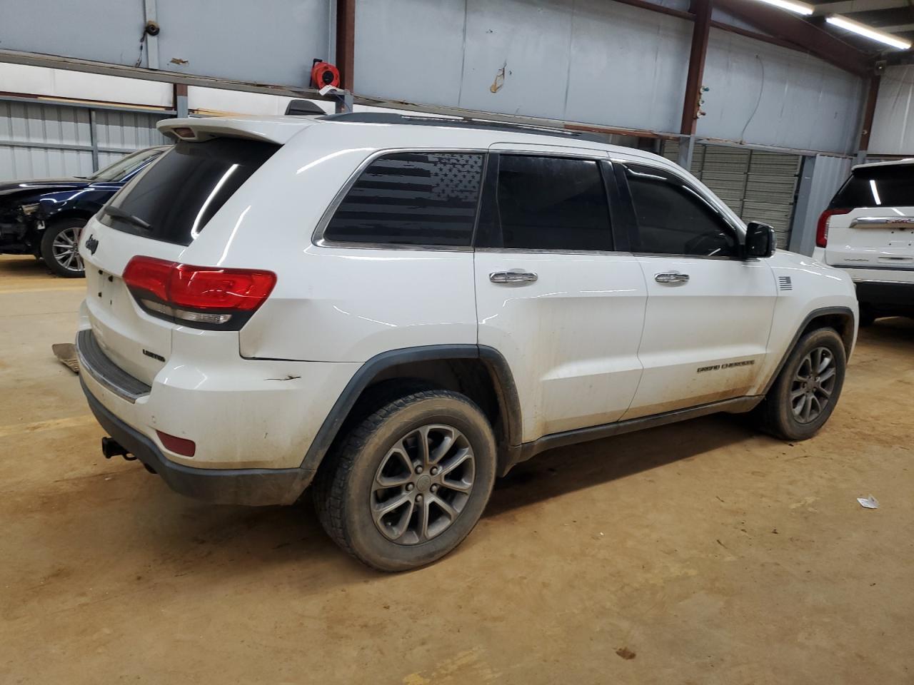 2015 Jeep Grand Cherokee VIN 1C4RJFBG6FC704034 Copart auction photo, front end / side damage thumbnail 3