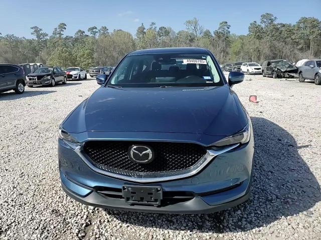 2021 Mazda CX-5 VIN JM3KFADM6M0381439 Copart auction photo, rear end damage thumbnail 14