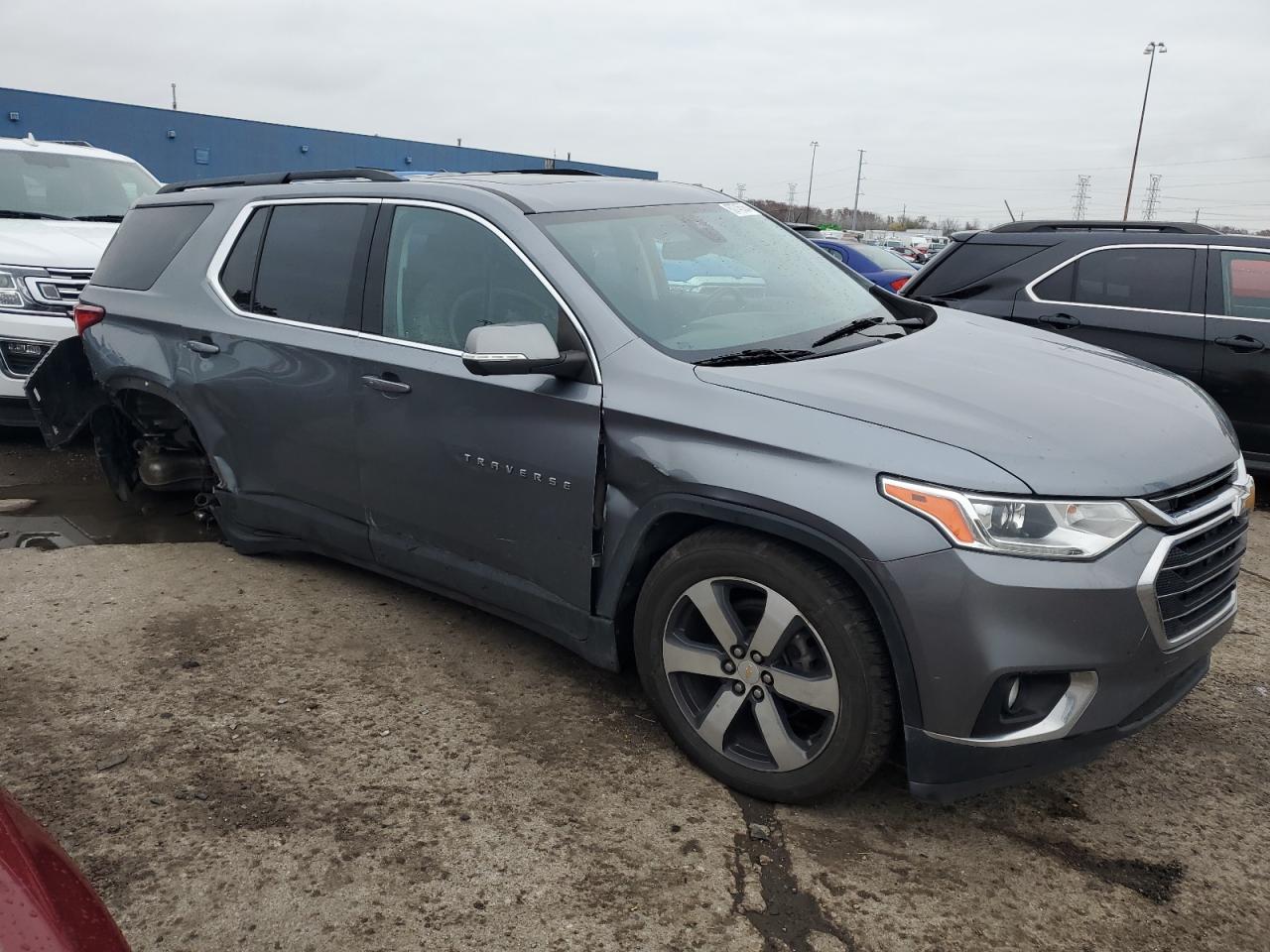 2021 Chevrolet Traverse VIN 1GNEVHKW0MJ131850 Copart auction photo, all over damage thumbnail 4