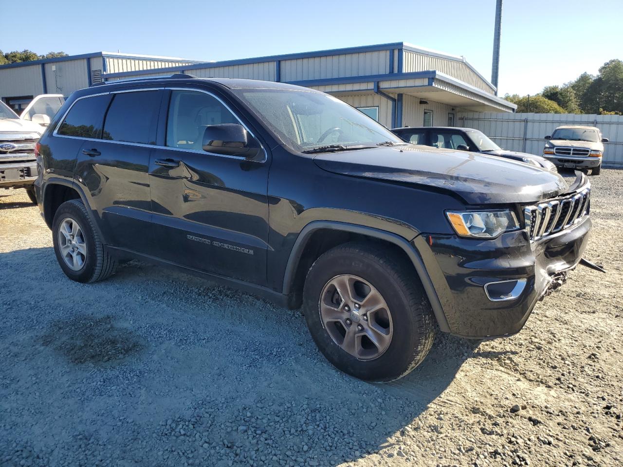 2017 Jeep Grand Cherokee VIN 1C4RJFAG8HC875646 Copart auction photo, front end / side damage thumbnail 4