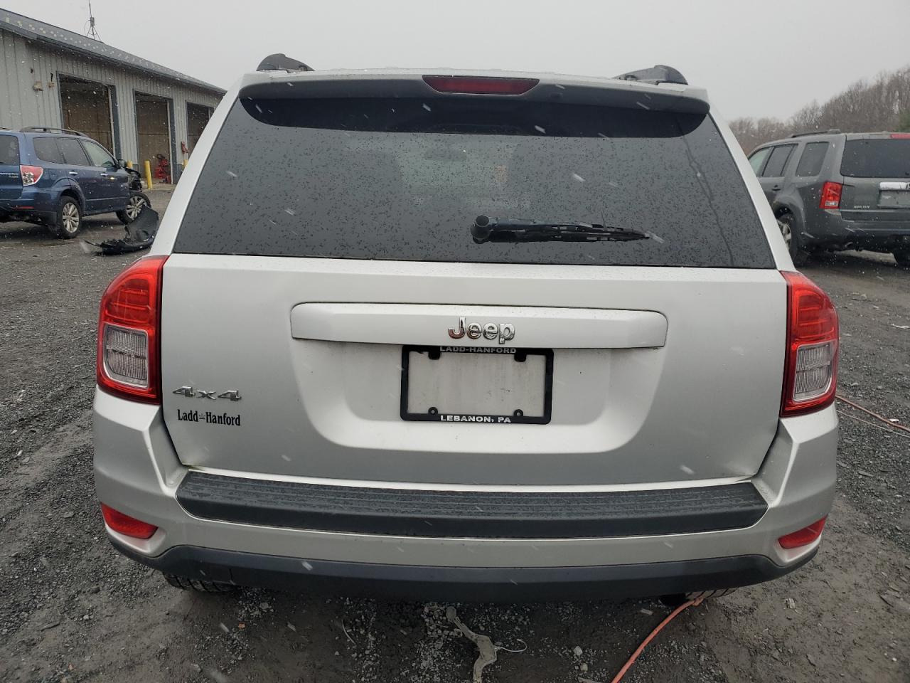 2011 Jeep Compass VIN 1J4NF1FB5BD258569 Copart auction photo, front end damage thumbnail 6