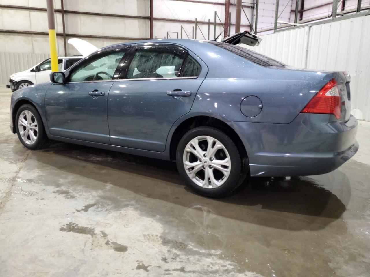 2012 Ford Fusion VIN 3FAHP0HA2CR432532 Copart auction photo, side / front end damage thumbnail 2