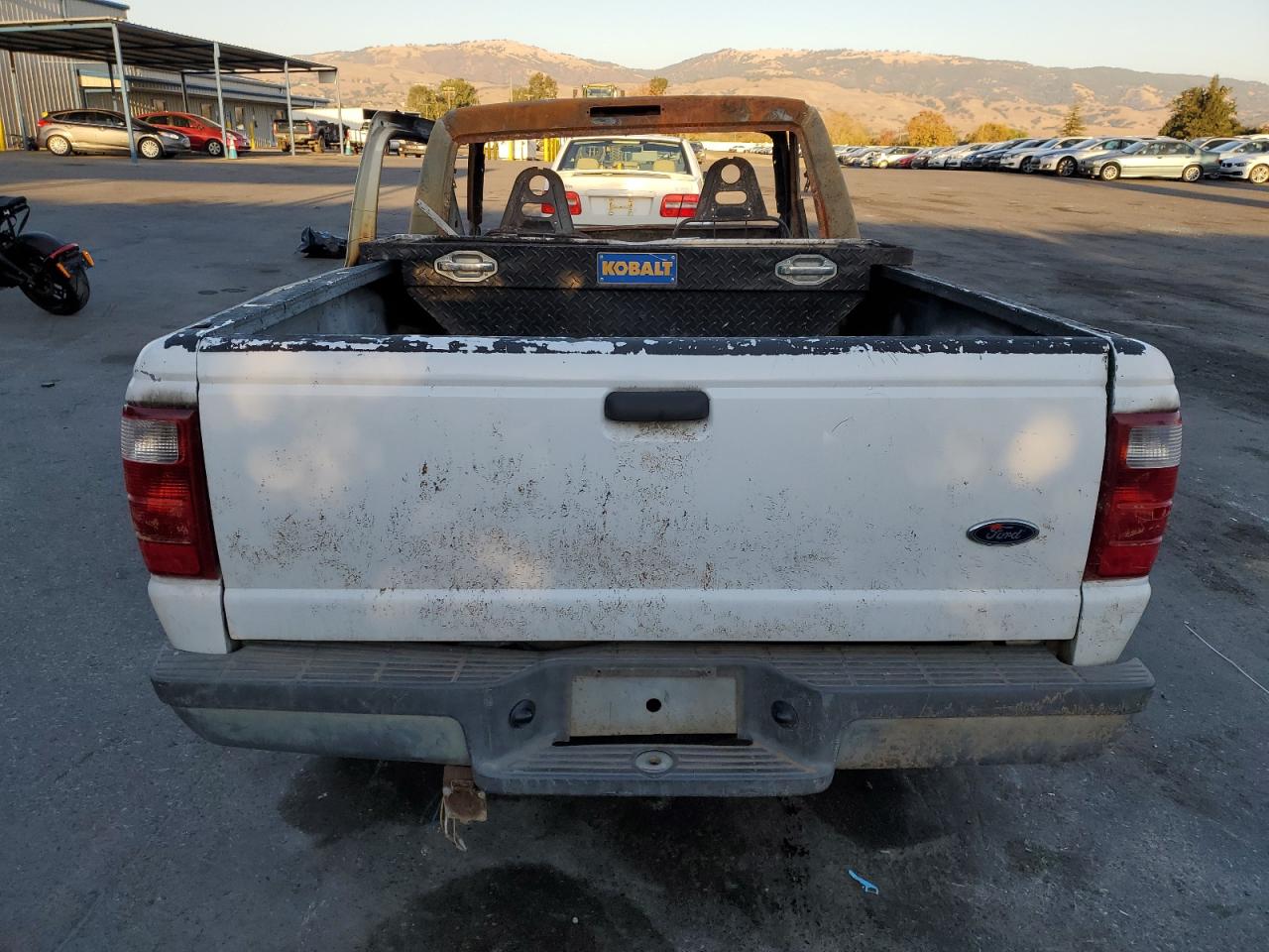 2003 Ford Ranger VIN 1FTYR10D03PB78651 Copart auction photo, burn damage thumbnail 6