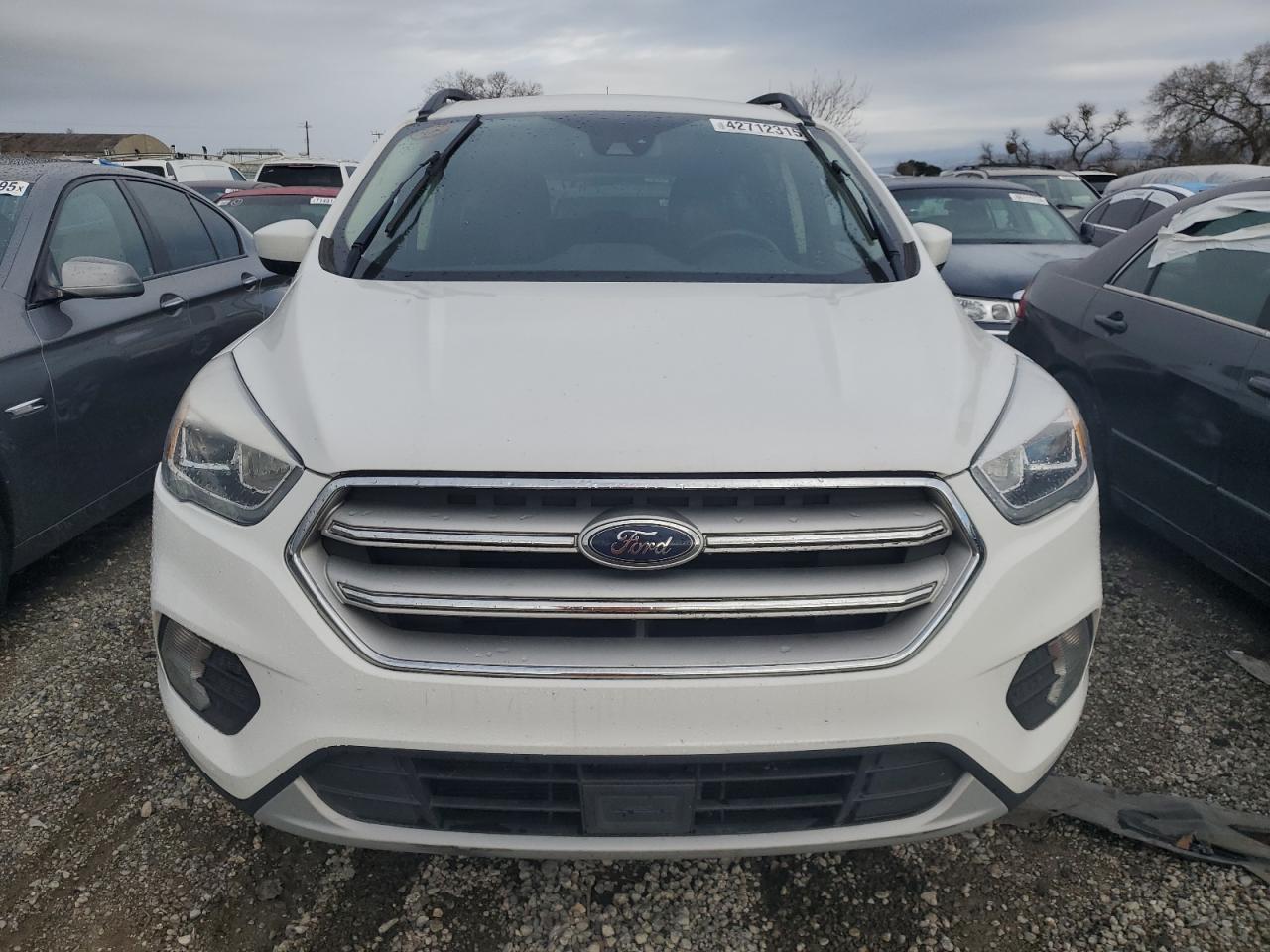 2018 Ford Escape VIN 1FMCU9HD6JUD31703 Copart auction photo, minor dent/scratches damage thumbnail 5