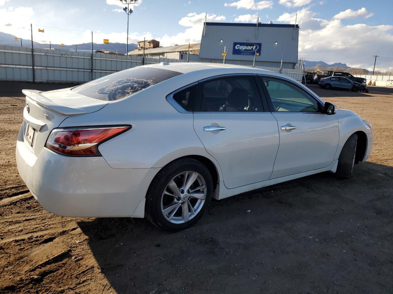 2015 Nissan Altima VIN 1N4AL3AP9FN864250 Copart auction photo, vandalism / minor dent/scratches damage thumbnail 3