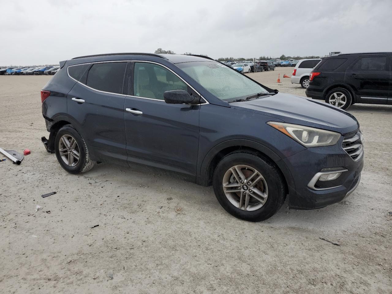 2017 Hyundai Santa Fe VIN 5NMZU3LB3HH029479 Copart auction photo, rear end damage thumbnail 4
