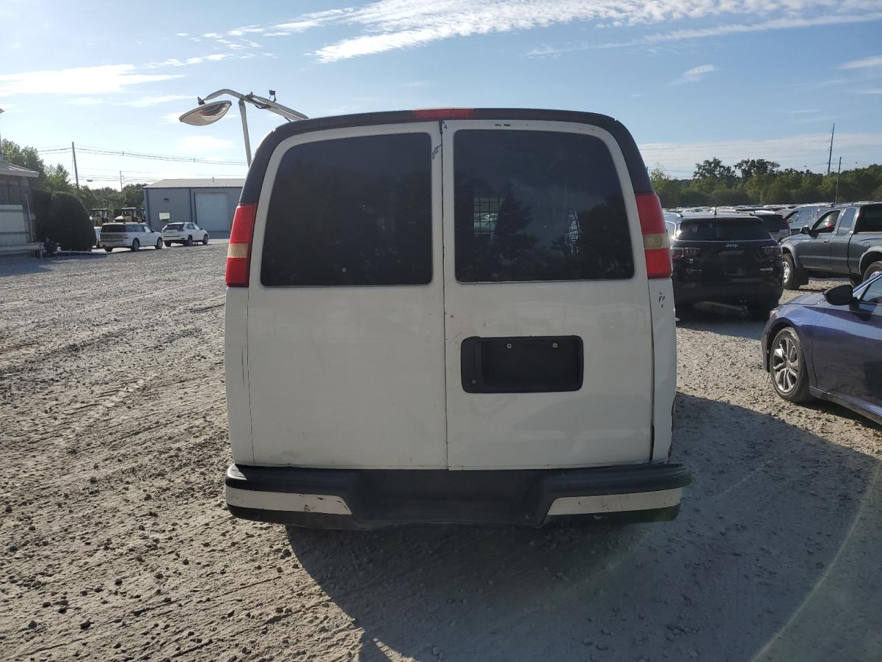 2010 Chevrolet Express VIN 1GCUGADX4A1163109 Copart auction photo, side / front end damage thumbnail 6