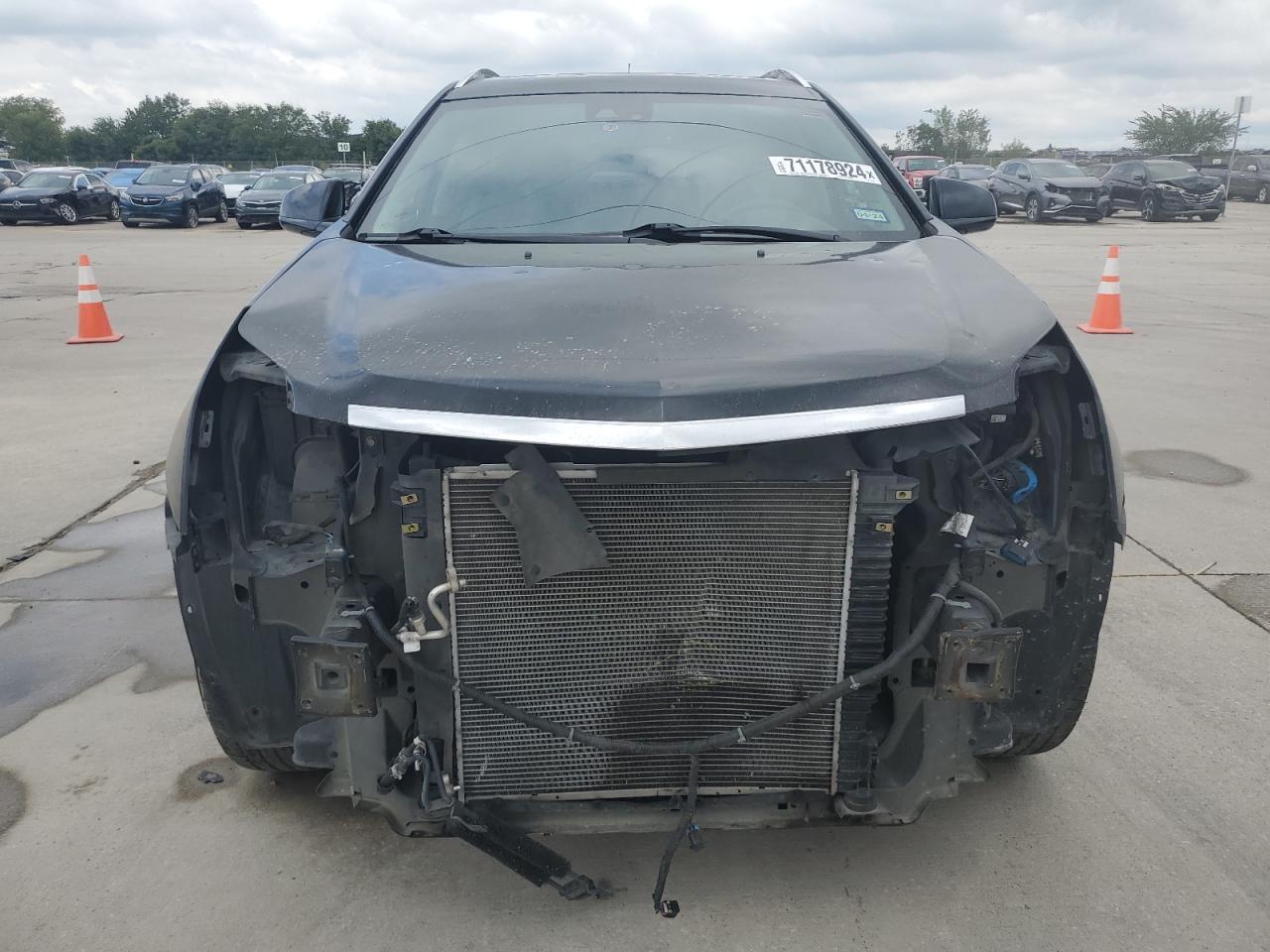 2016 Cadillac SRX VIN 3GYFNDE34GS569520 Copart auction photo, front end damage thumbnail 5