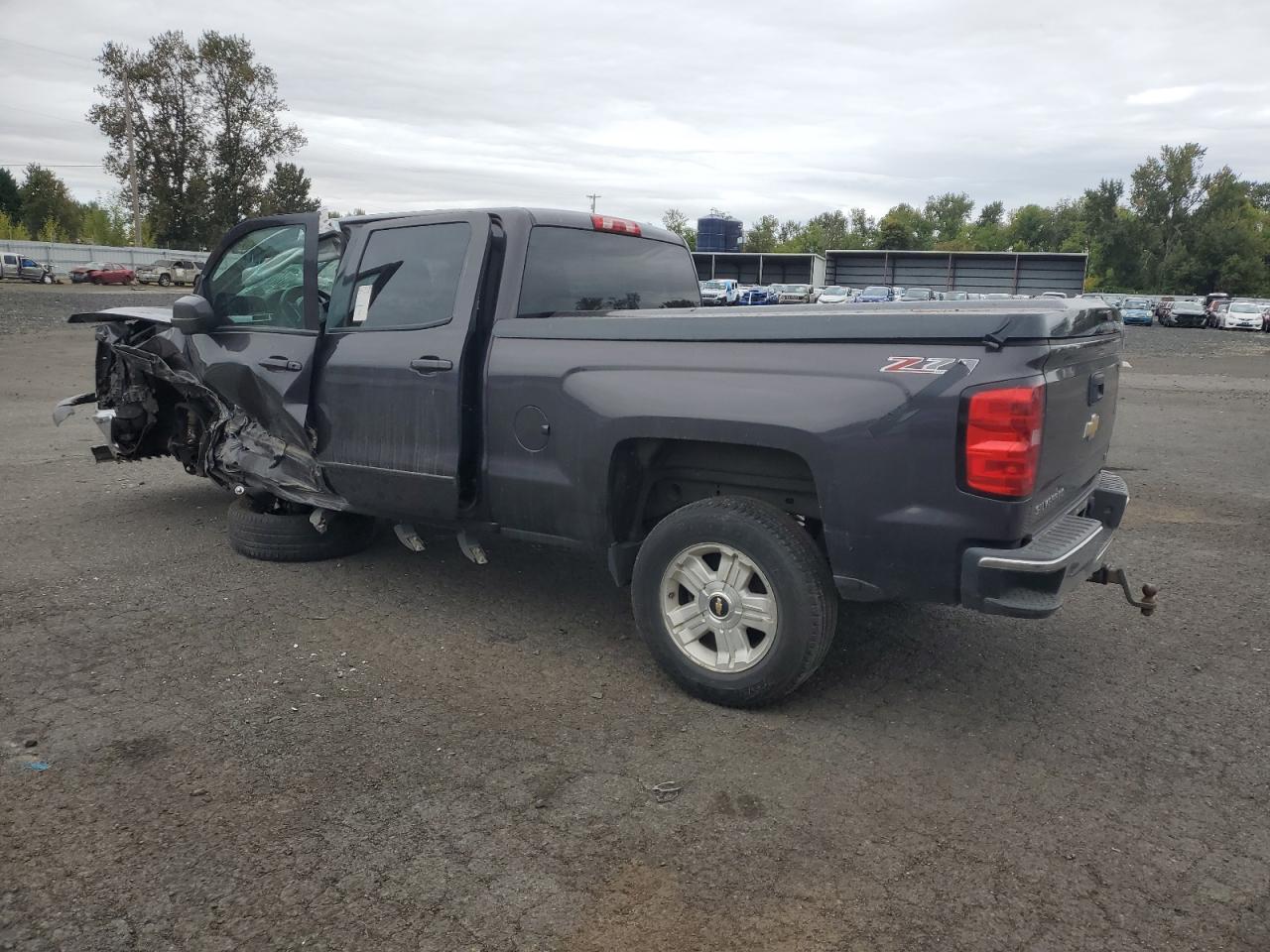 2015 Chevrolet Silverado VIN 3GCUKREC8FG167455 Copart auction photo, all over / undercarriage damage thumbnail 2
