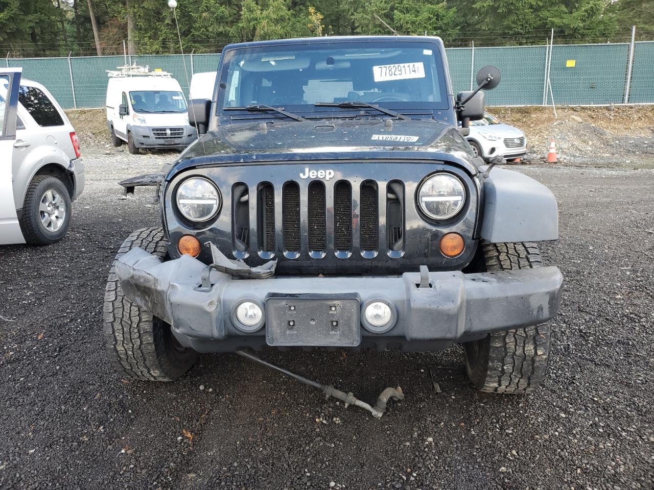 2010 Jeep Wrangler VIN 1J4BA3H11AL218754 Copart auction photo, undercarriage / front end damage thumbnail 5