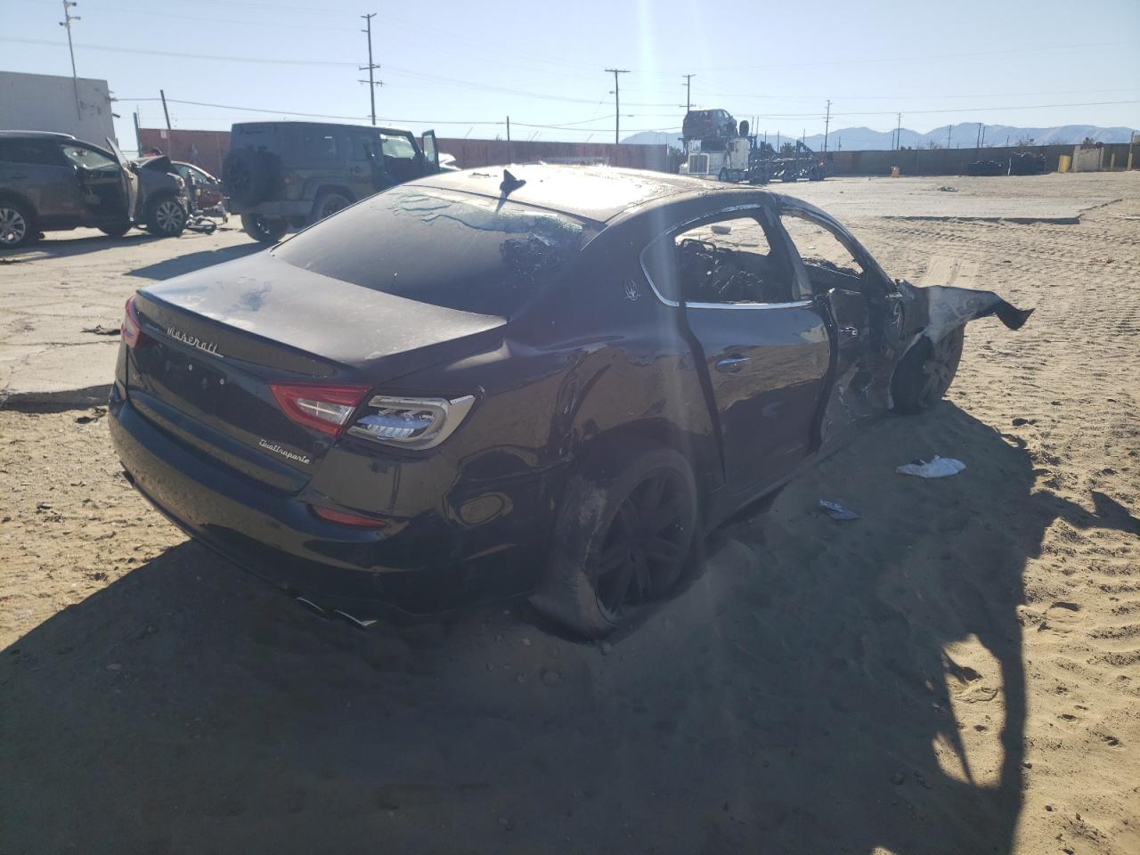 2015 Maserati Quattroporte VIN ZAM56RRA7F1143479 Copart auction photo, burn damage thumbnail 3