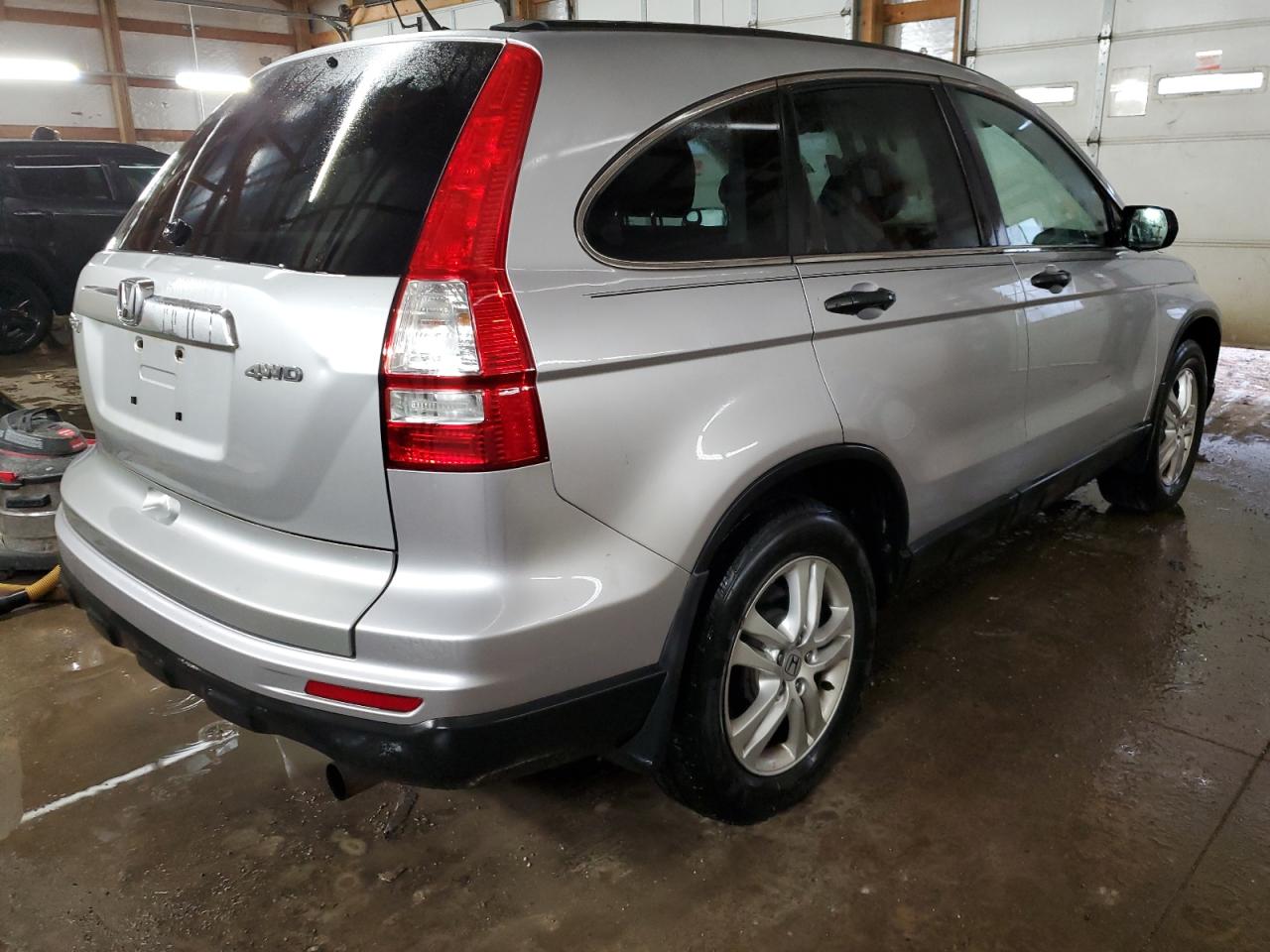 2010 Honda CR-V VIN 3CZRE4H53AG700974 Copart auction photo, side / minor dent/scratches damage thumbnail 3