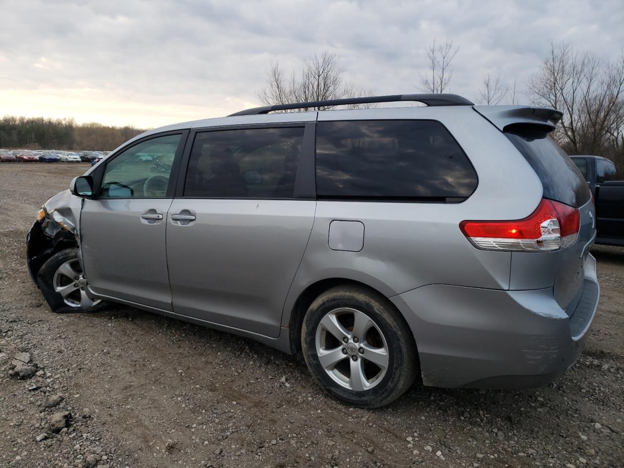 2012 Toyota Sienna VIN 5TDKK3DC9CS213796 Copart auction photo, front end / side damage thumbnail 2