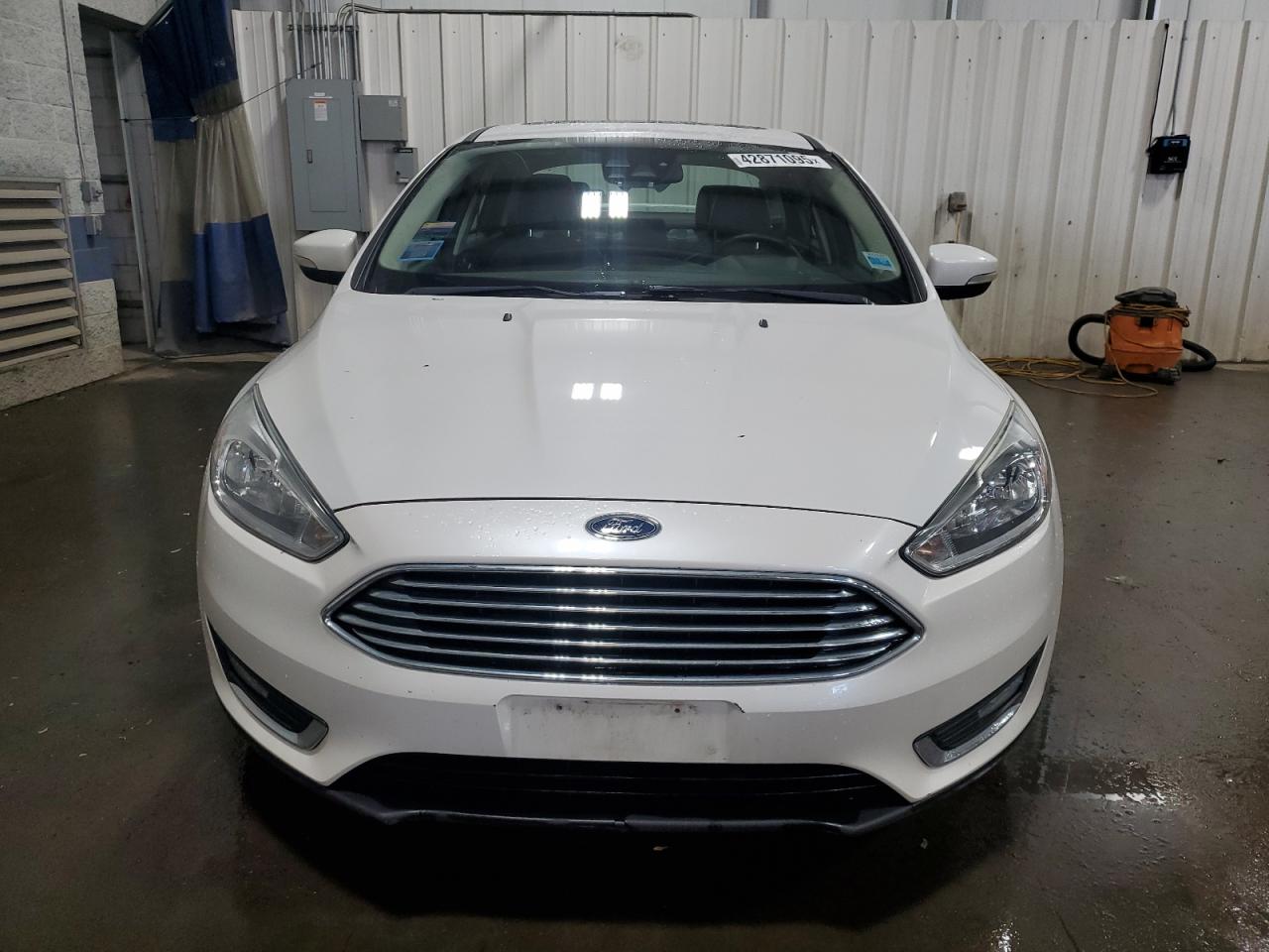 2016 Ford Focus VIN 1FADP3J26GL324793 Copart auction photo, rear end / side damage thumbnail 5