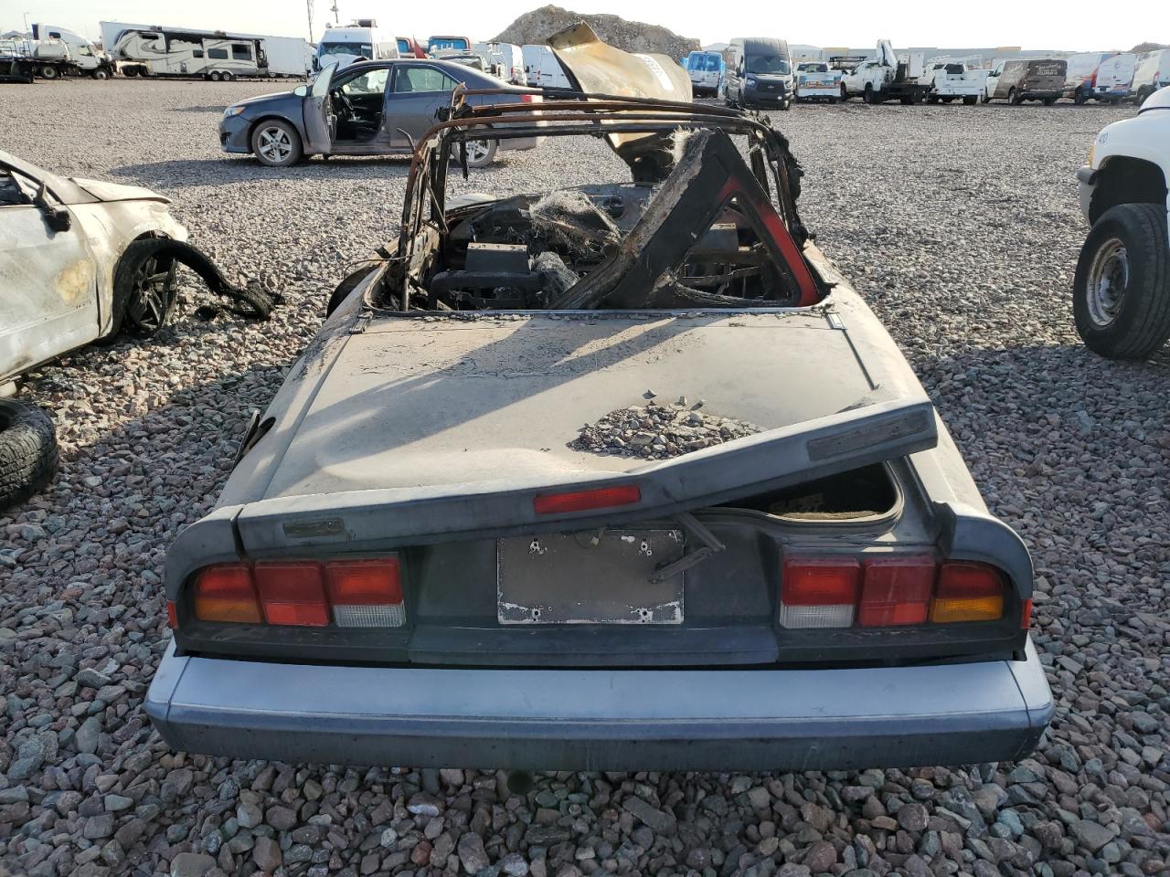 1988 Alfa Romeo Spider VIN ZARBA5585J1058172 Copart auction photo, burn damage thumbnail 6