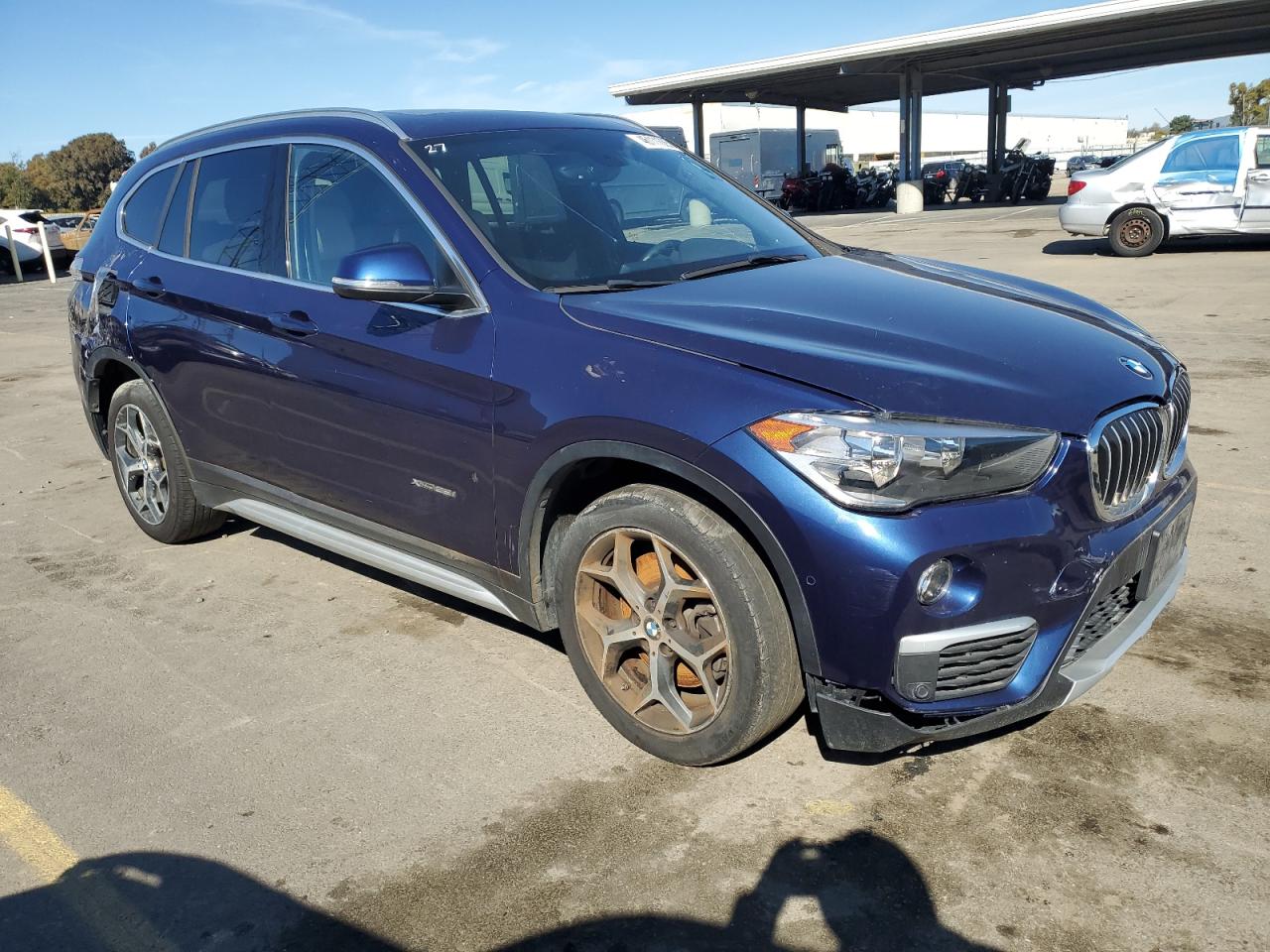 2018 BMW X1 VIN WBXHT3C34J5F93387 Copart auction photo, side damage thumbnail 4