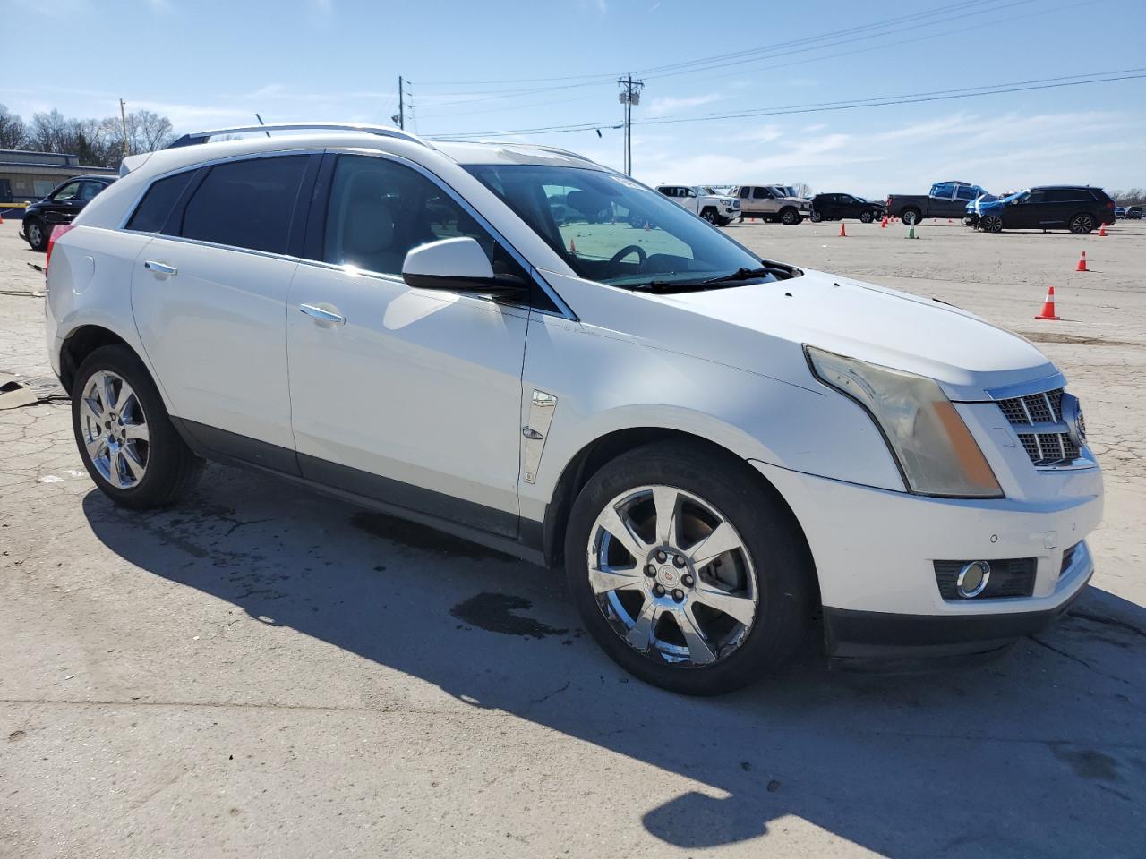 2012 Cadillac SRX VIN 3GYFNBE32CS518399 Copart auction photo, front end / minor dent/scratches damage thumbnail 4