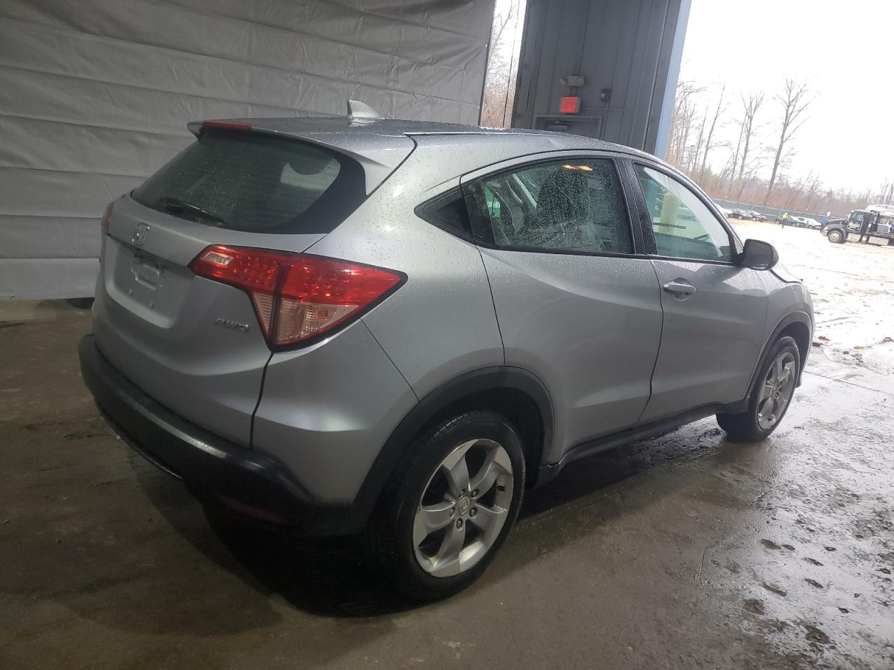 2018 Honda HR-V VIN 3CZRU6H33JG708523 Copart auction photo, side / front end damage thumbnail 3