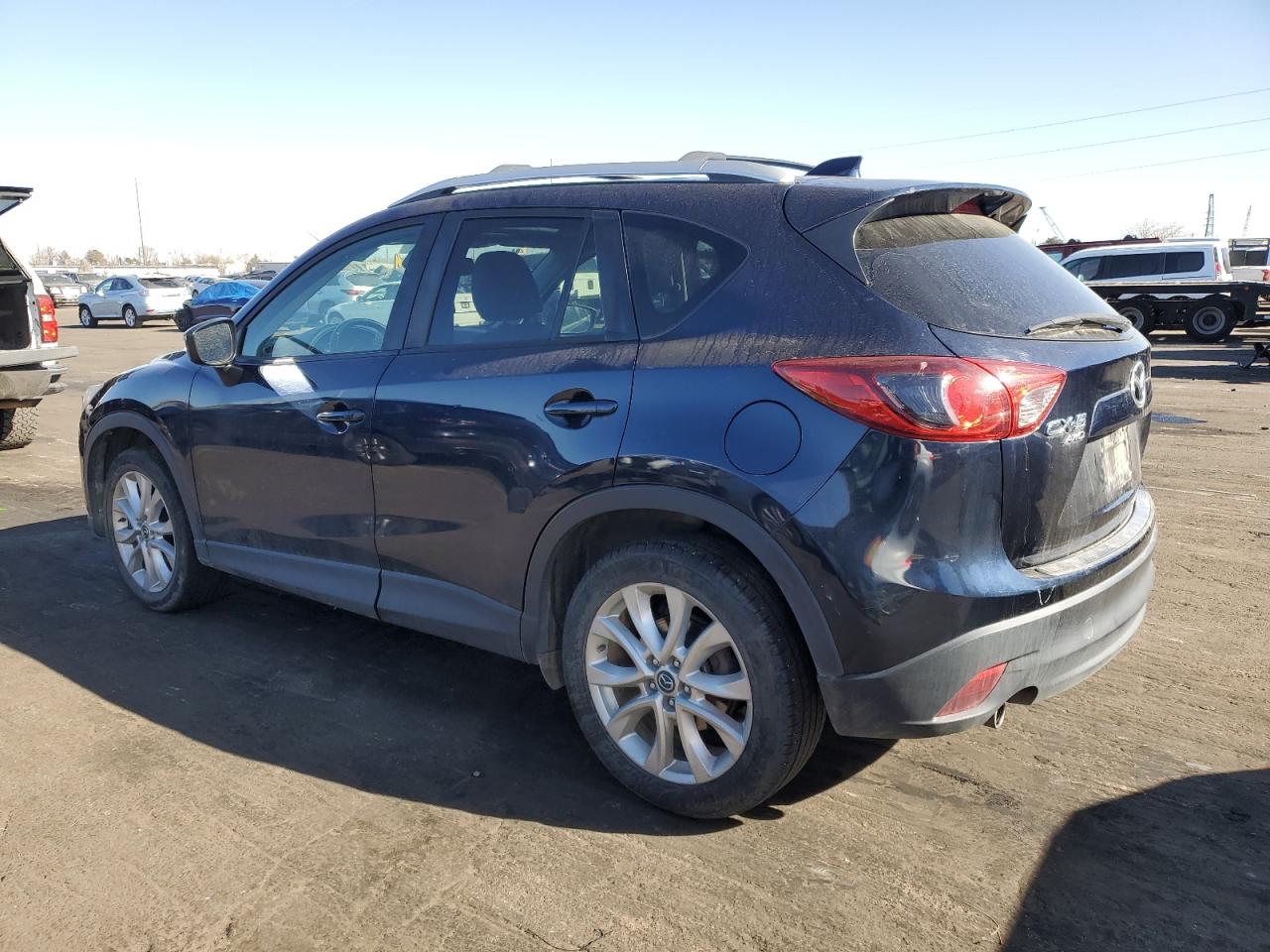 2015 Mazda CX-5 VIN JM3KE4DY3F0553517 Copart auction photo, front end / hail damage thumbnail 2