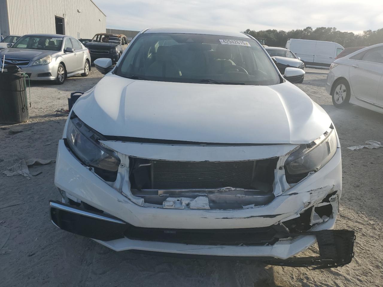 2019 Honda Civic VIN 19XFC2F65KE025463 Copart auction photo, front end damage thumbnail 5