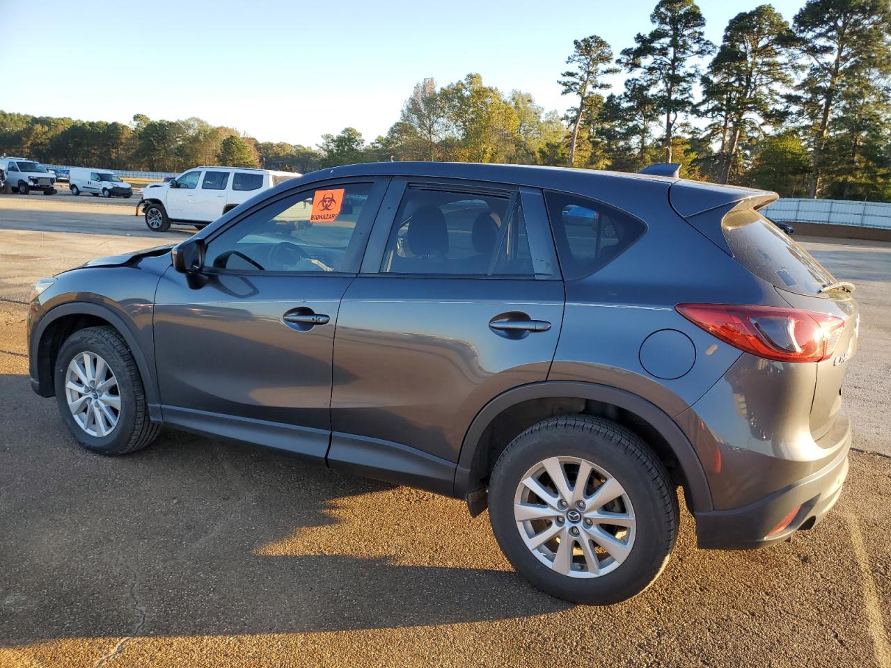 2015 Mazda CX-5 VIN JM3KE2CY1F0524393 Copart auction photo, front end / side damage thumbnail 2