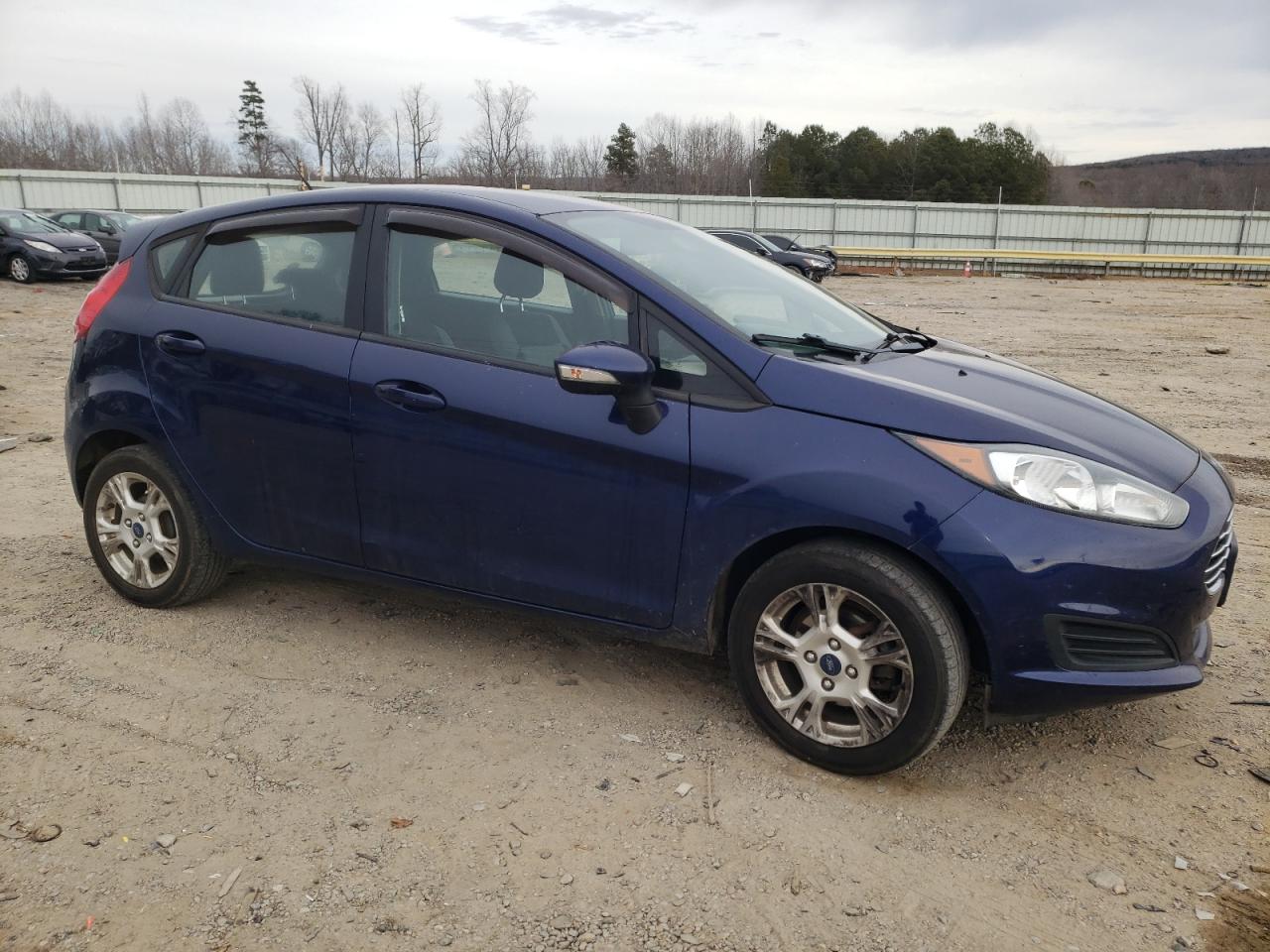 2016 Ford Fiesta VIN 3FADP4EJXGM182390 Copart auction photo, all over damage thumbnail 4