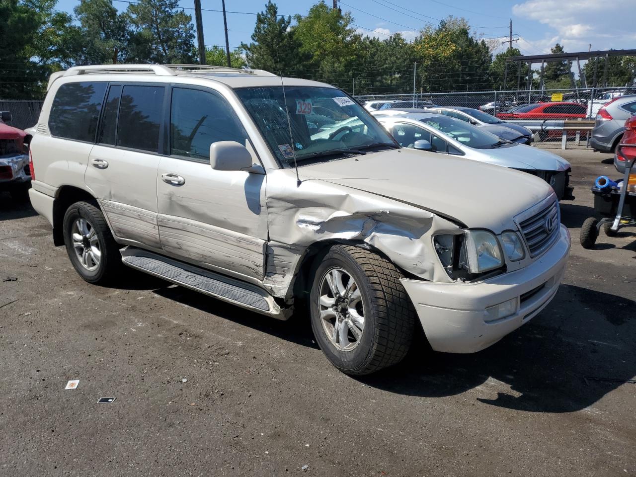 2004 Lexus LX VIN JTJHT00W843544262 Copart auction photo, side / front end damage thumbnail 4