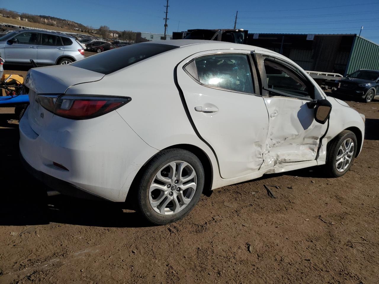 2017 Toyota Yaris VIN 3MYDLBYV6HY179698 Copart auction photo, side / rear end damage thumbnail 3